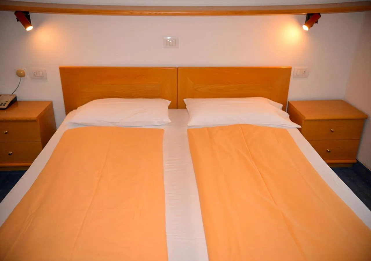 Bed in Hotel Regina Delle Dolomiti