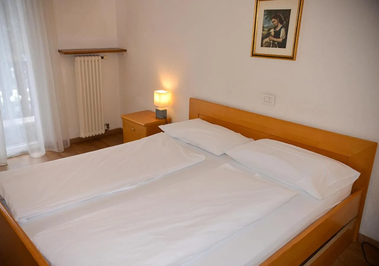 Photo of the whole room, Bed in Hotel Regina Delle Dolomiti