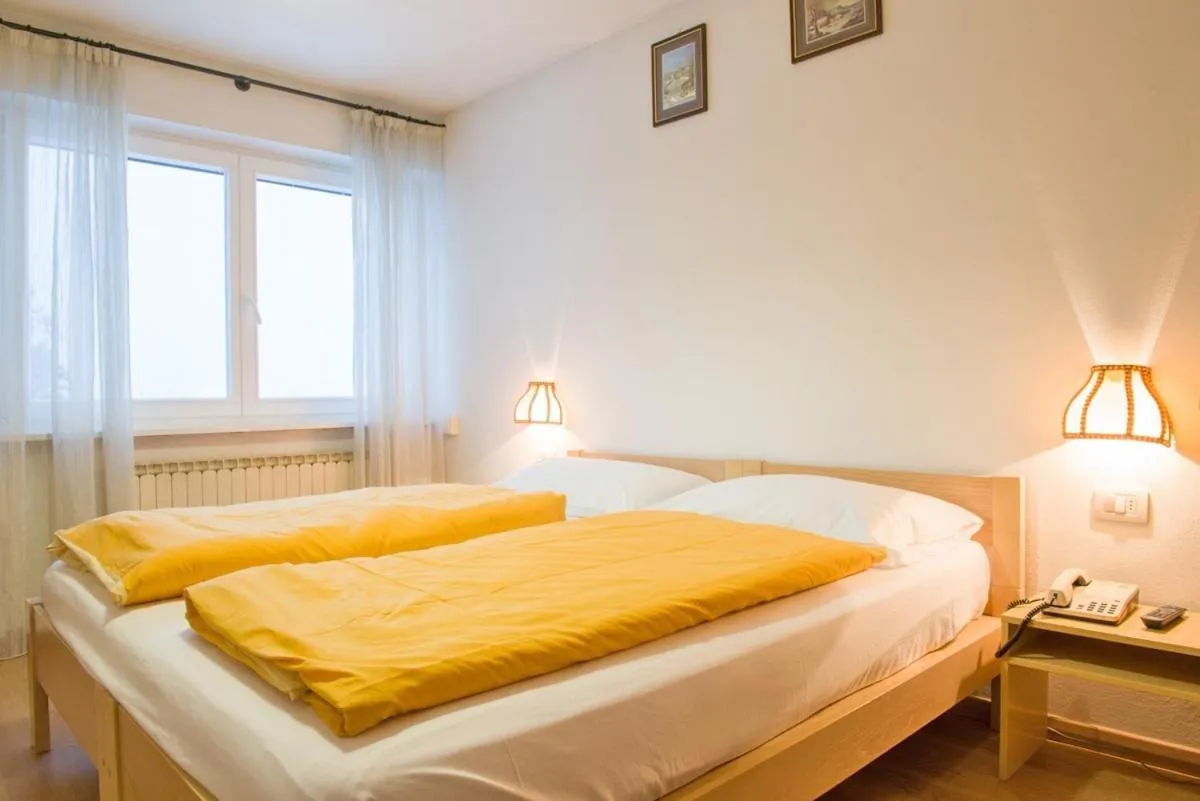 Bed in Hotel Regina Delle Dolomiti