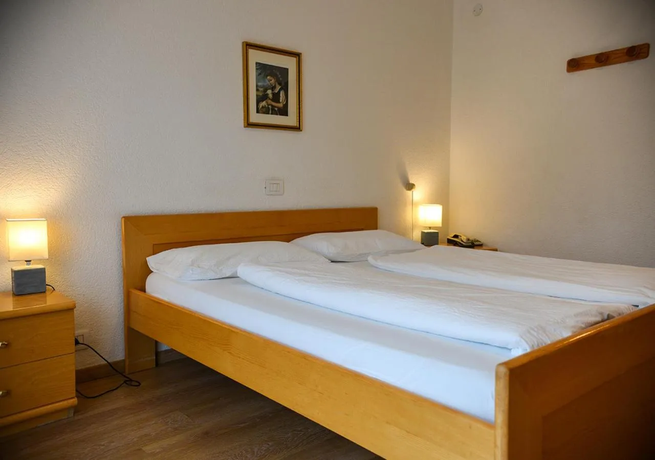 Bed in Hotel Regina Delle Dolomiti