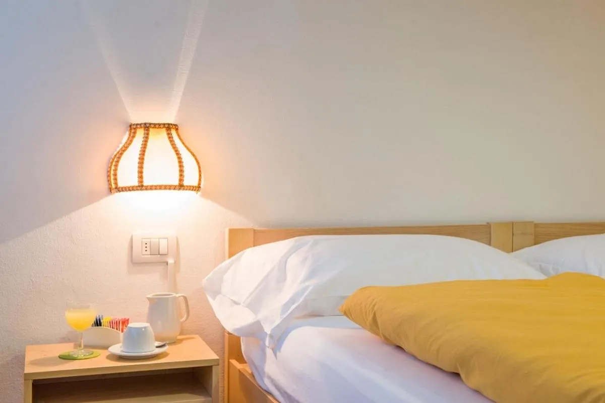 Bed in Hotel Regina Delle Dolomiti