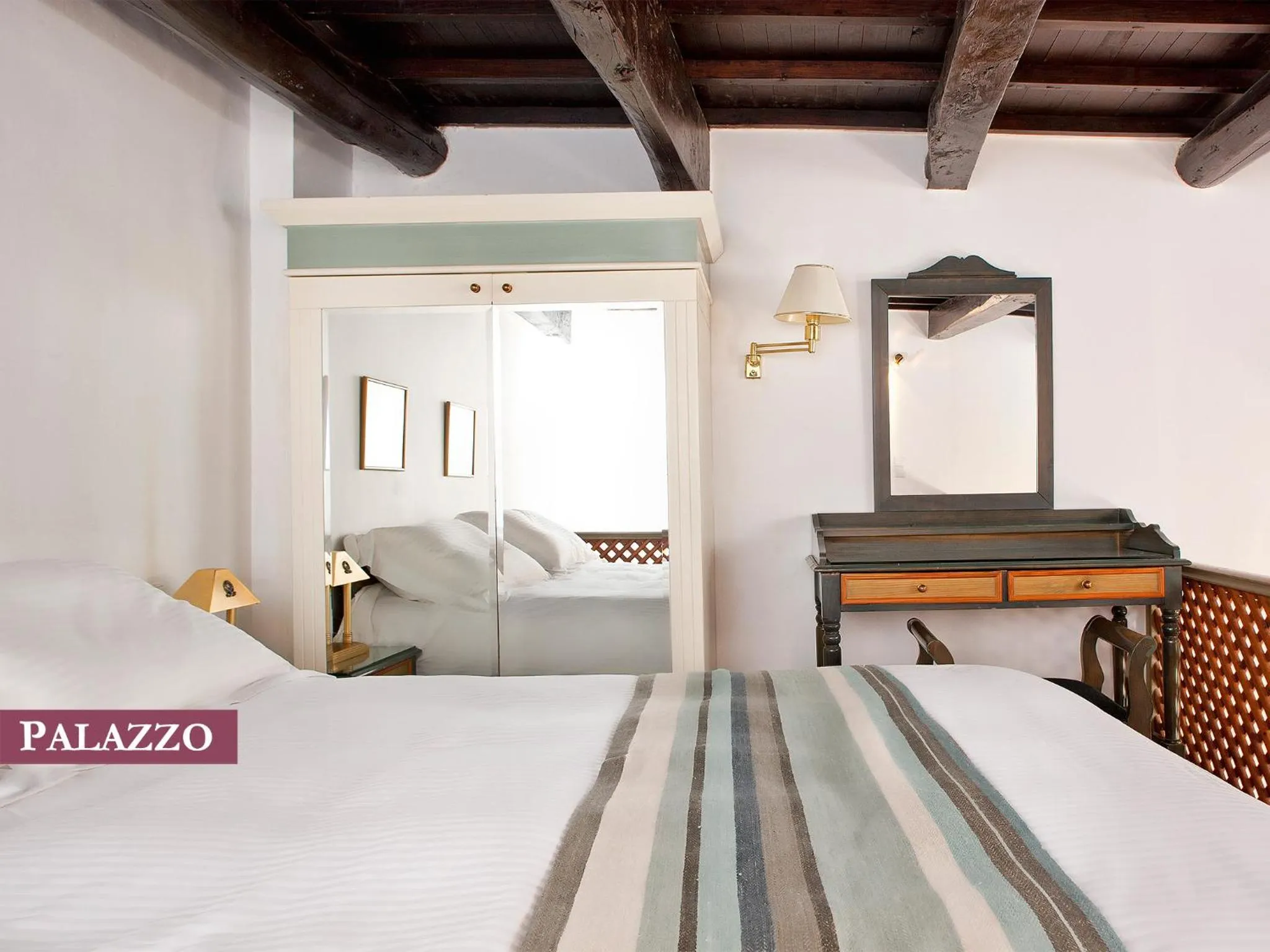 Bed in Rimondi Boutique Hotel - Small Luxury Hotels of the World