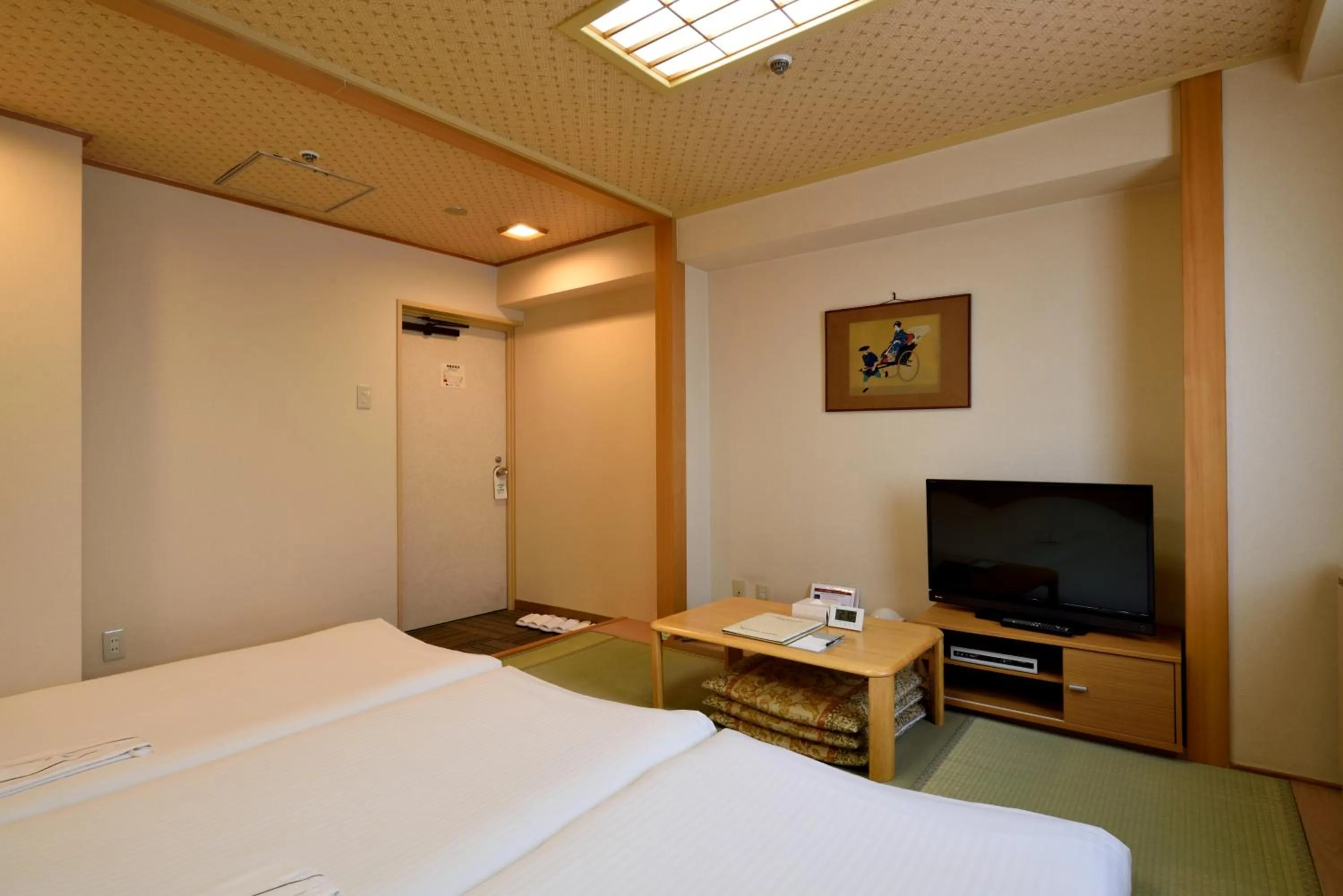 Seating area, Bed in Hotel Johzenji