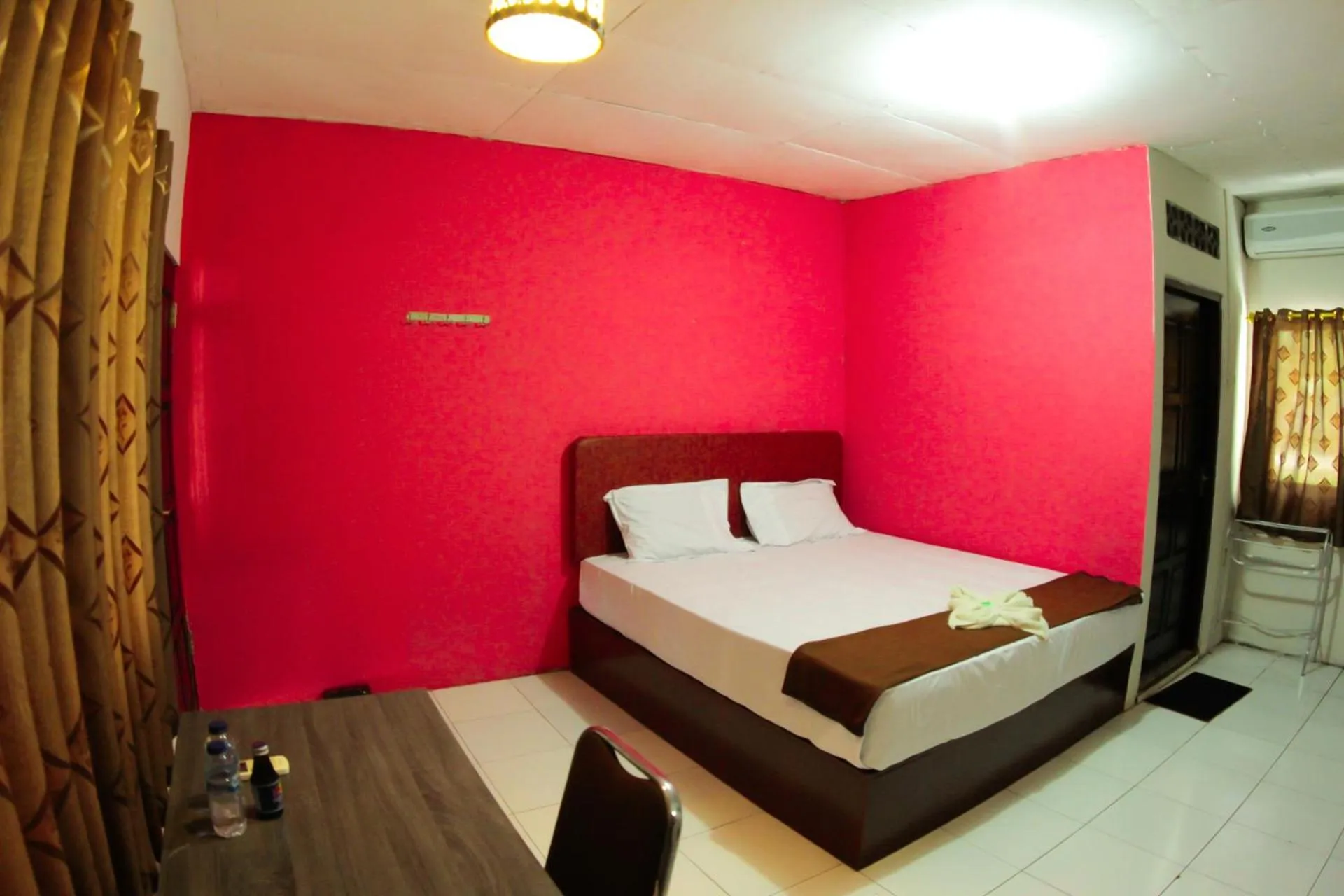 Bedroom in FX72 Beach Resort Maumere