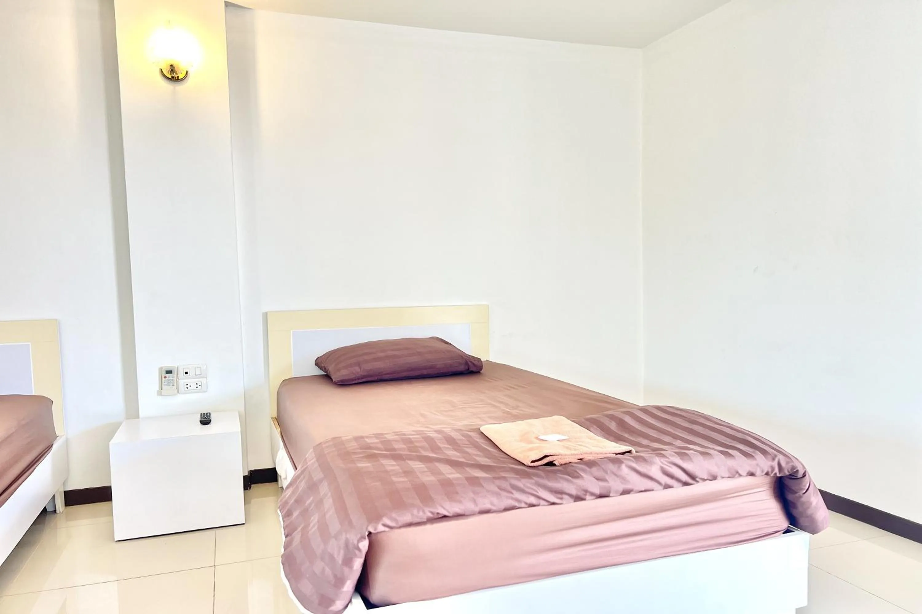 Bed in Grand Place Resort