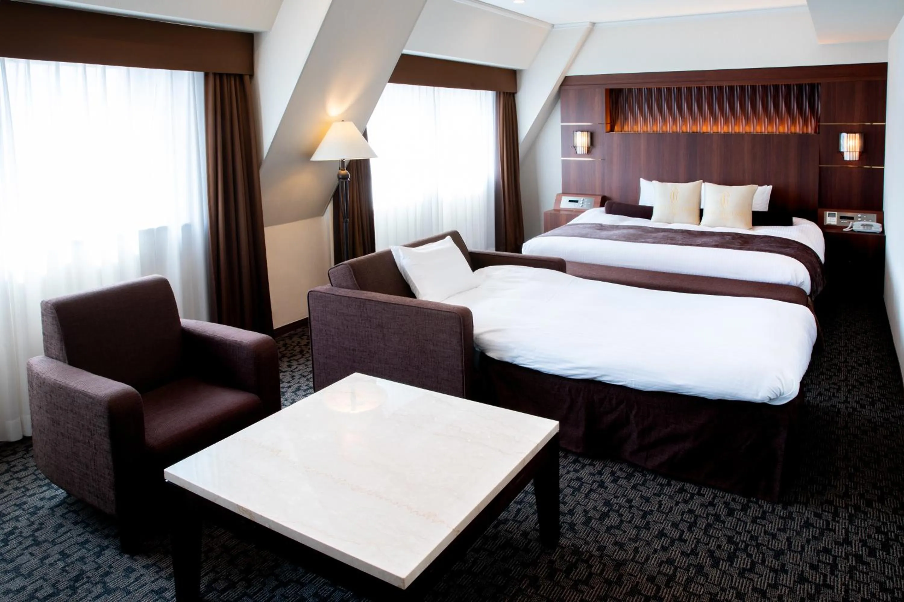 Bed in Hotel Bellclassic Tokyo