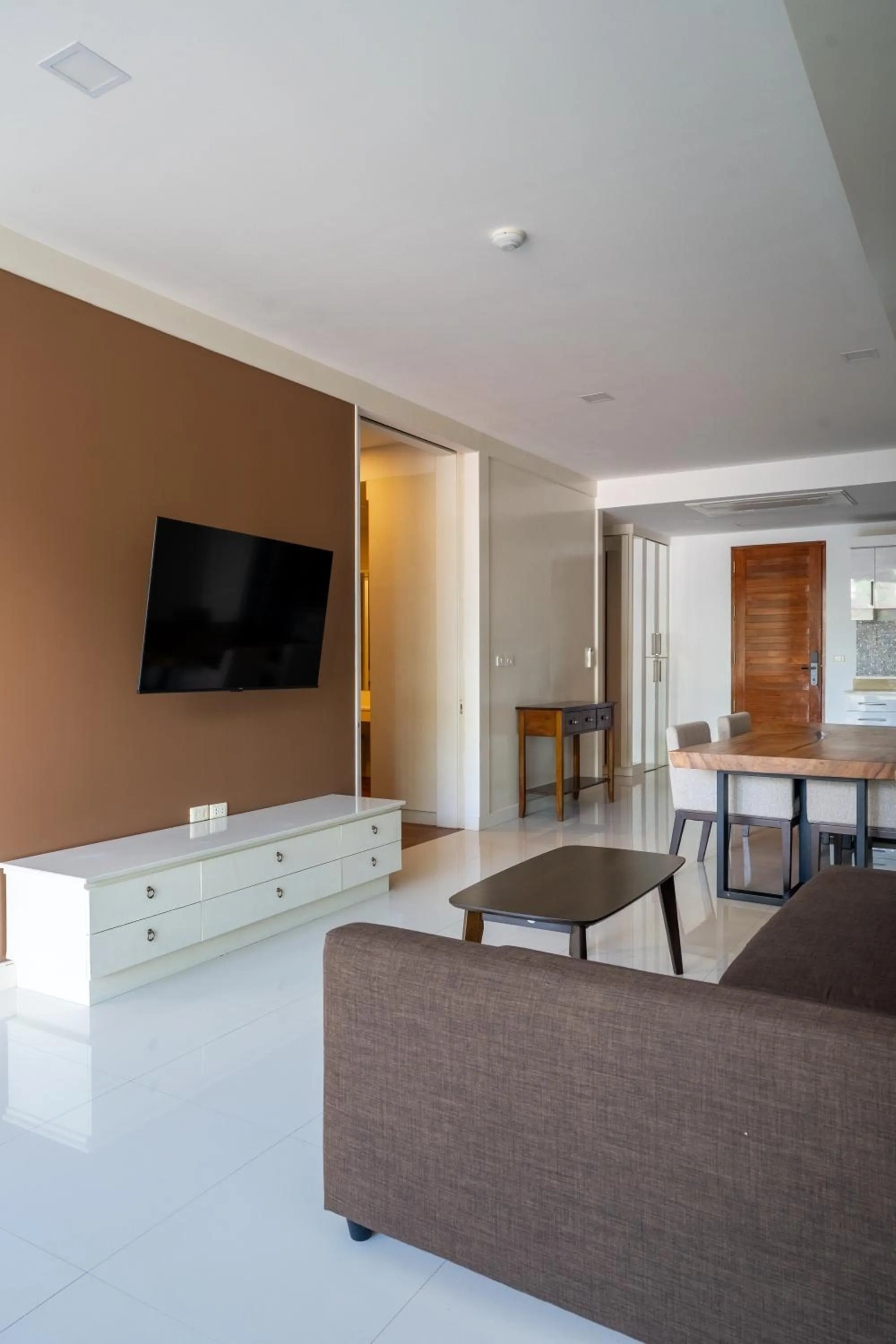 Communal lounge/ TV room in Q Kata Residence