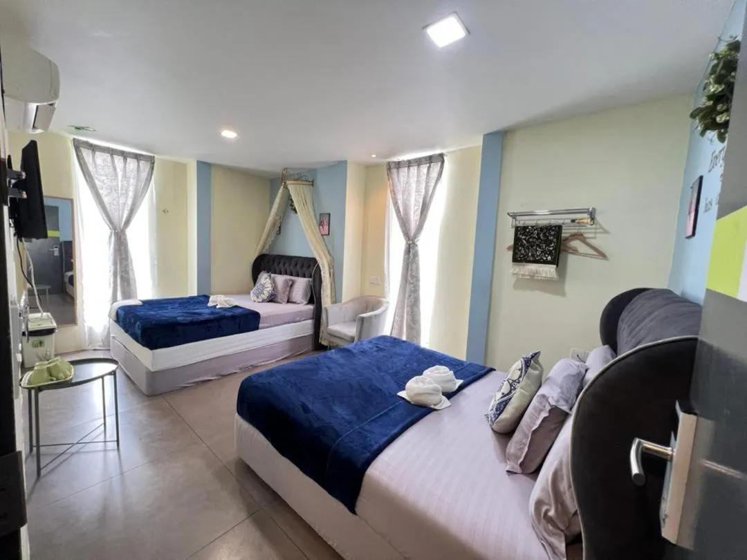 Bed in The Tree Boutique Hotel