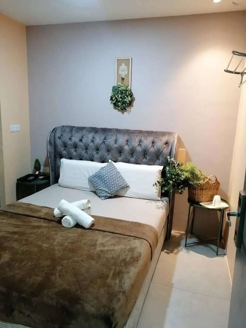 Bed in The Tree Boutique Hotel