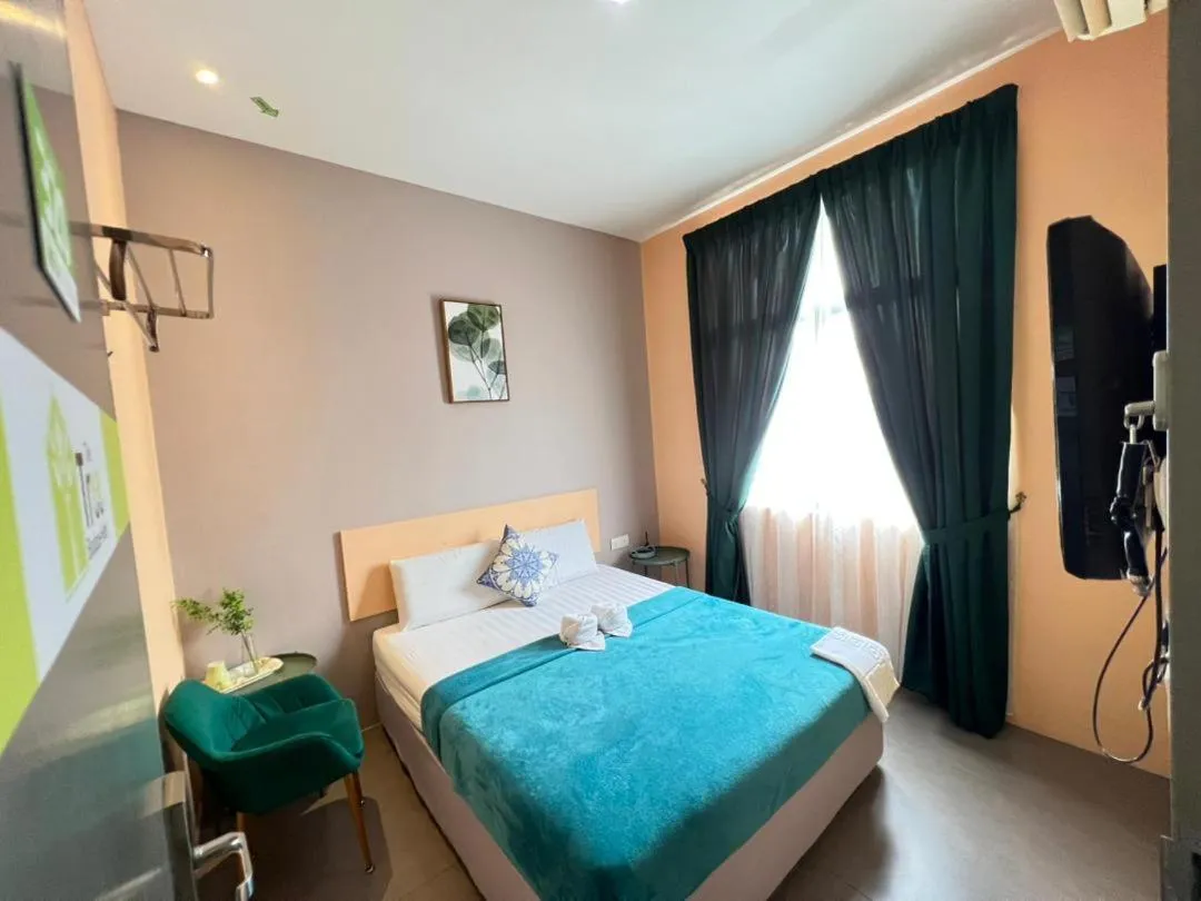 Bed in The Tree Boutique Hotel