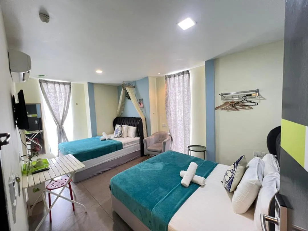 Bed in The Tree Boutique Hotel