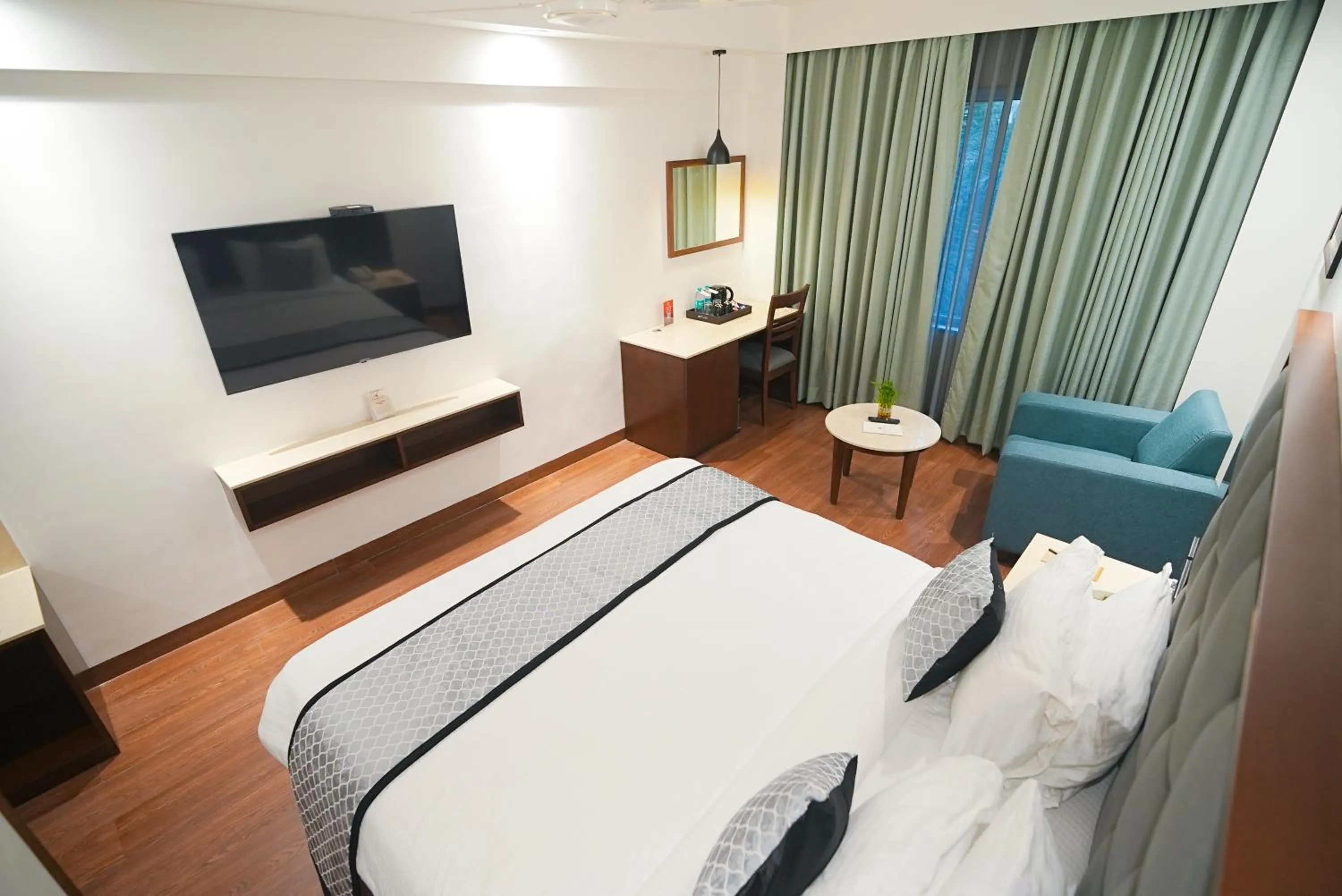 Bedroom, Bed in Ramee Guestline Tirupati