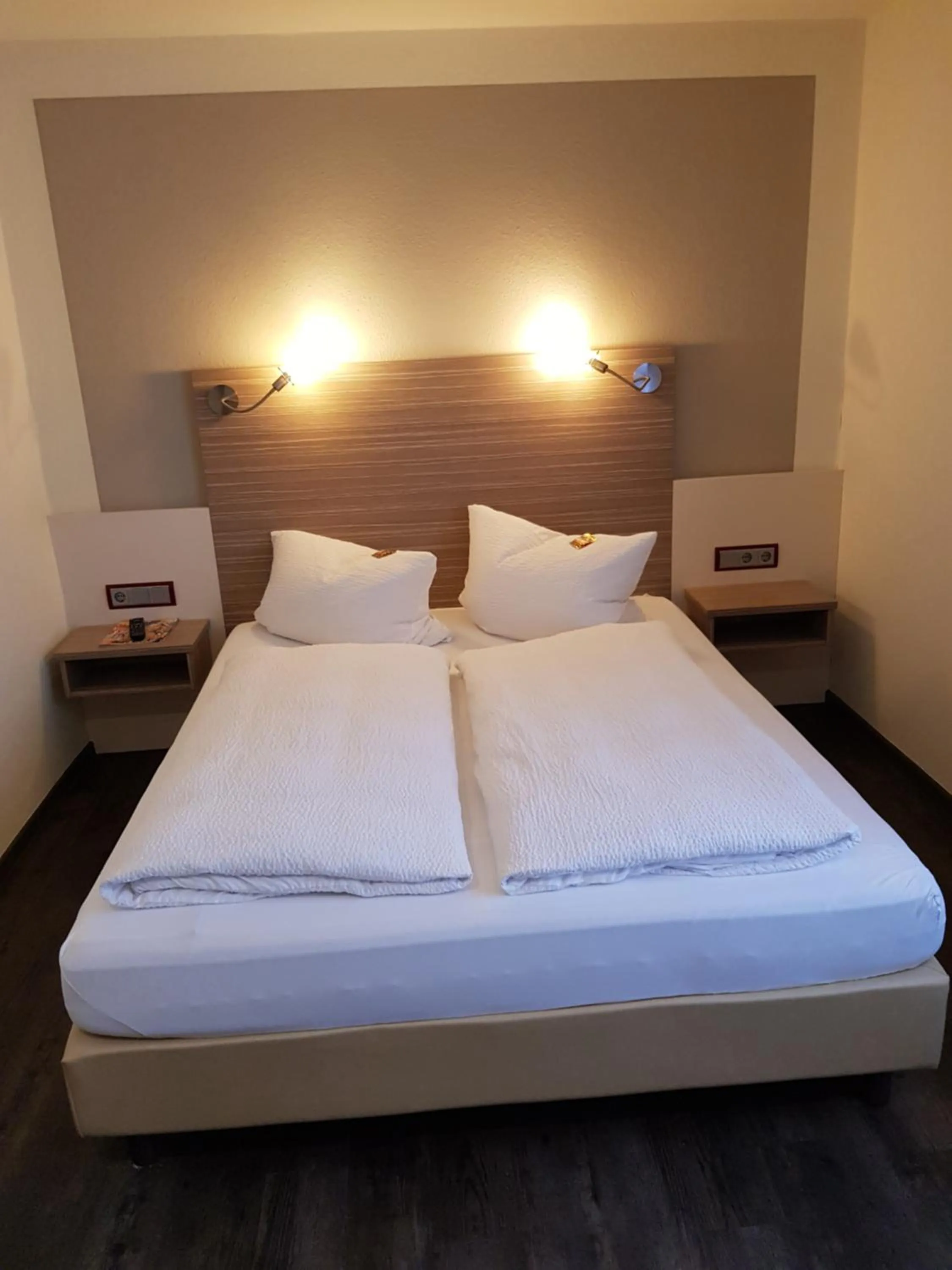 Bed in Hotel Mühleneck