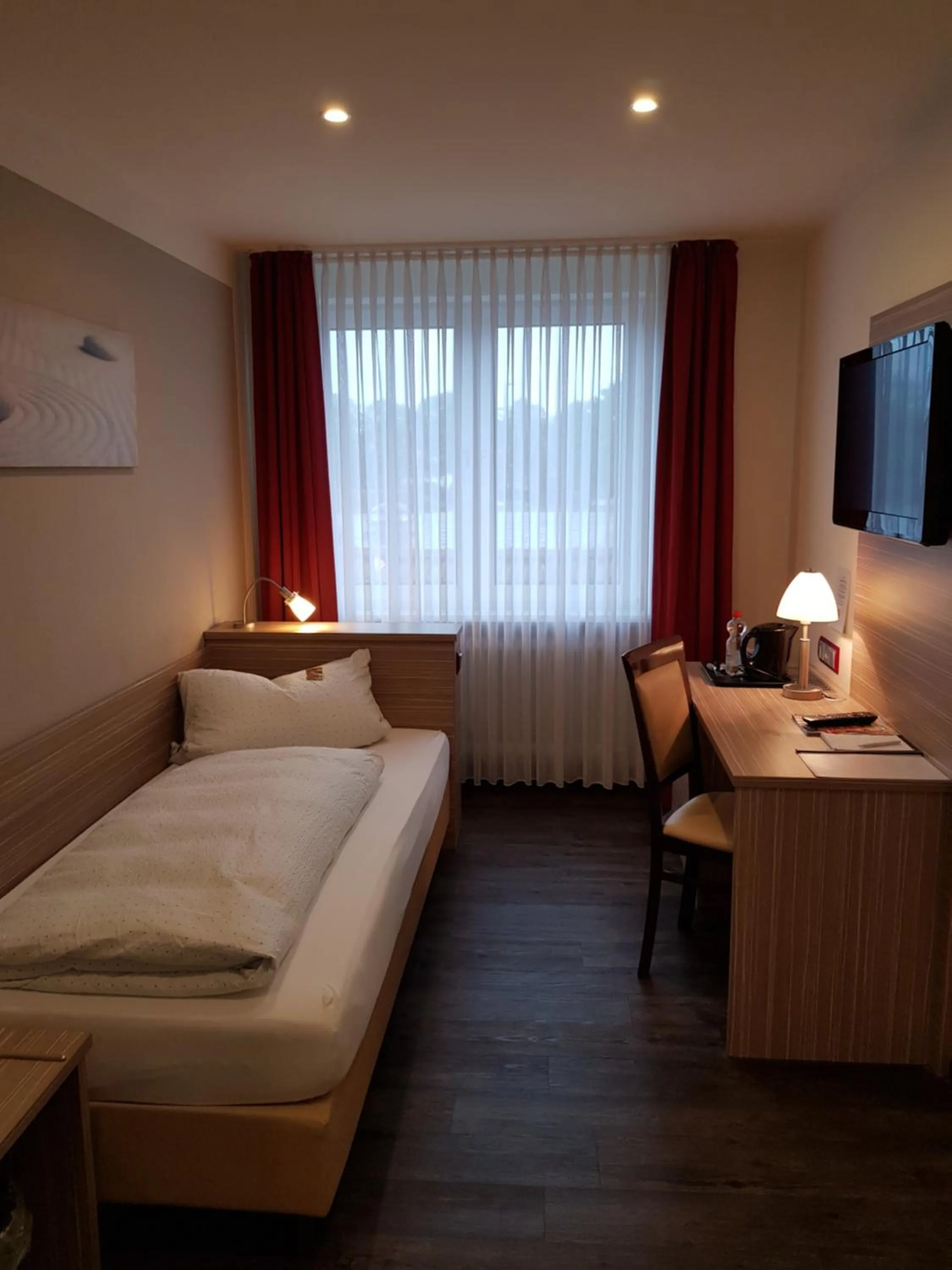 Photo of the whole room, Bed in Hotel Mühleneck