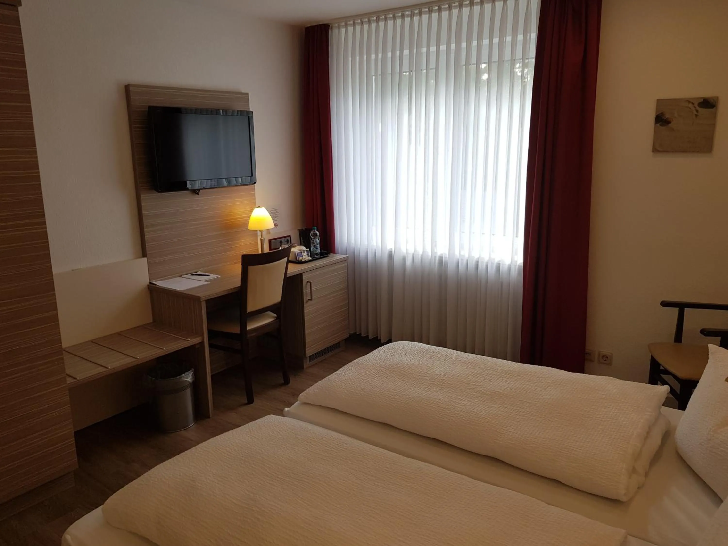 Photo of the whole room, Bed in Hotel Mühleneck