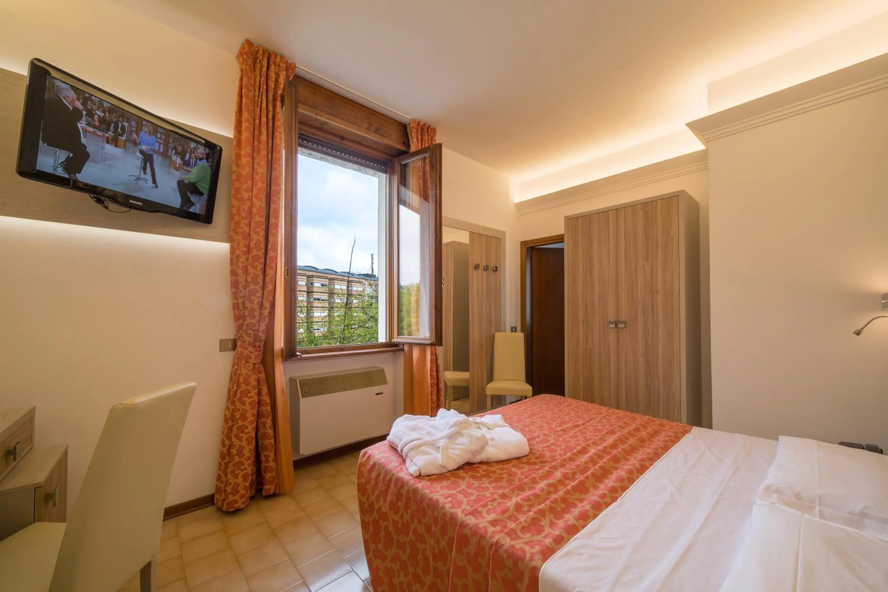 Bed in Hotel Carancini