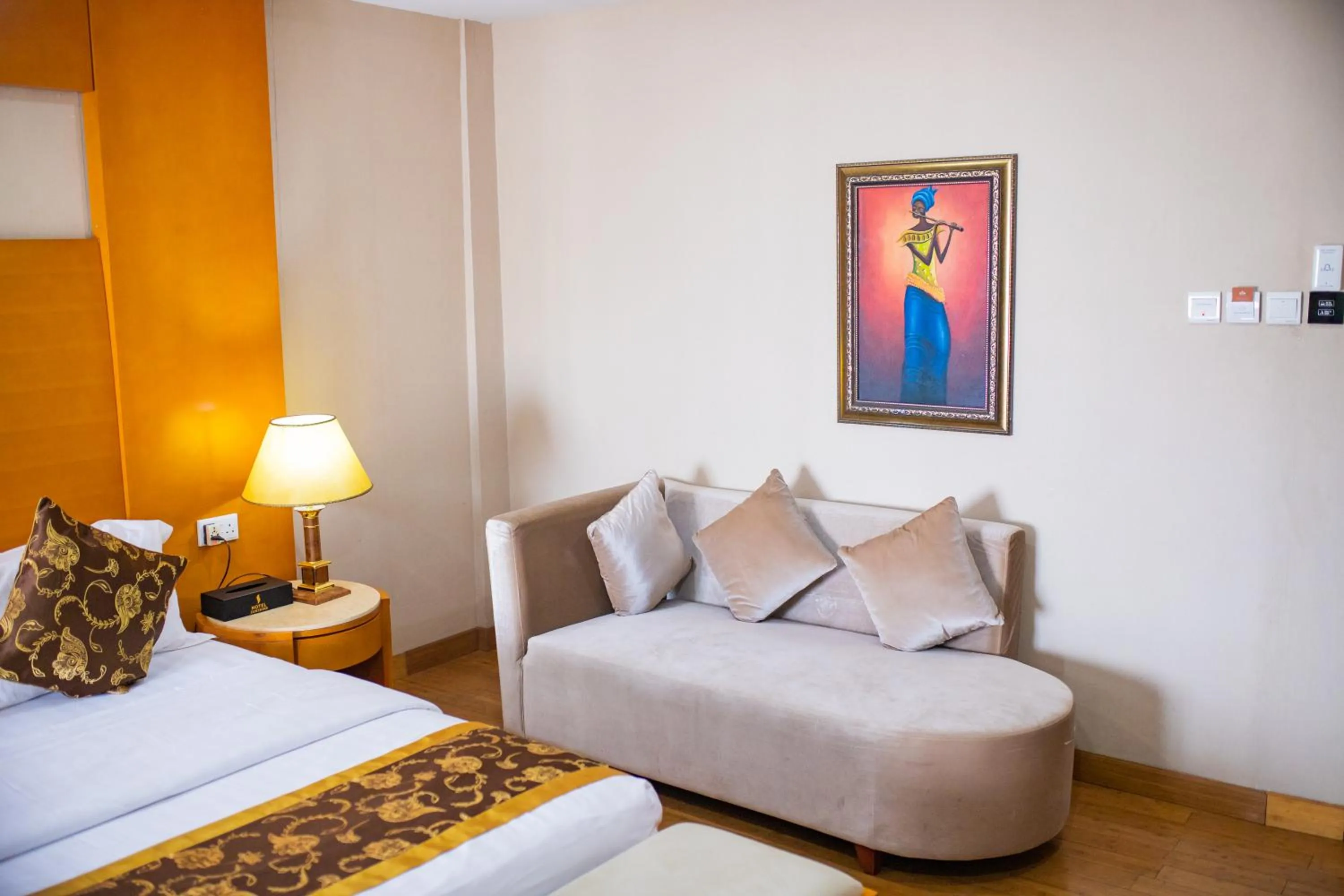 Seating area, Bed in Hotel Sunshine Enugu