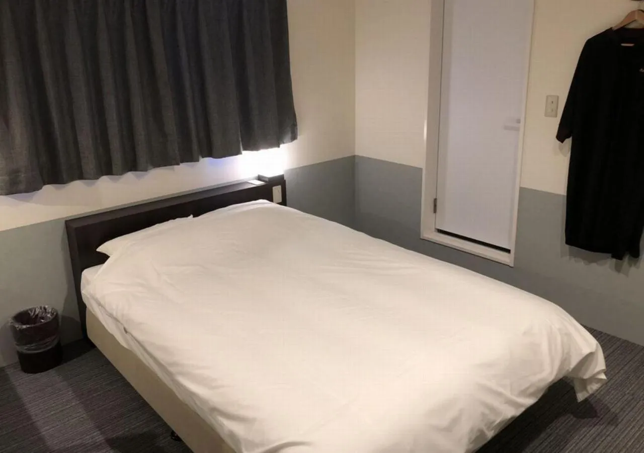 Bed in Hotel Taiyo Nouen Furumitsu