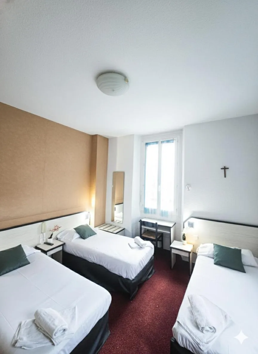 Photo of the whole room, Bed in Hôtel Myosotis