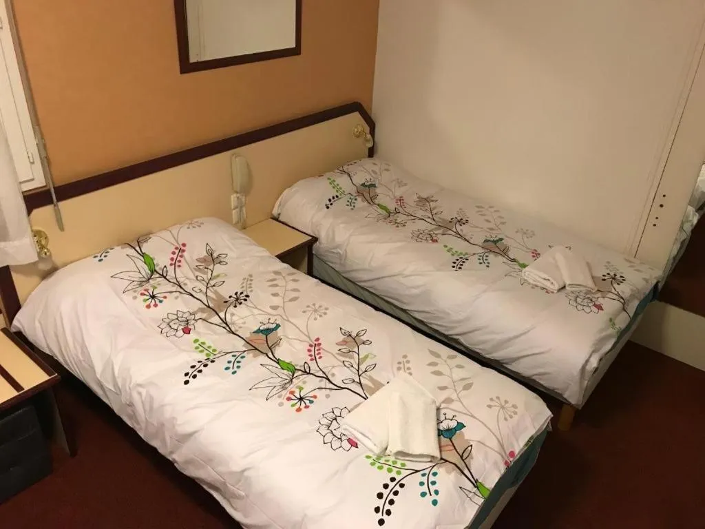 Bed in Hôtel Myosotis