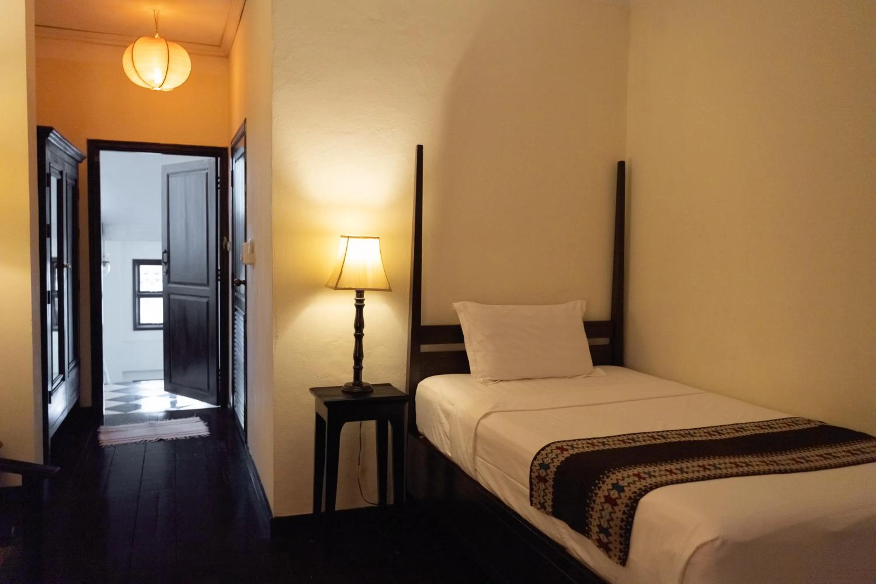 Bed in Hotel Khamvongsa