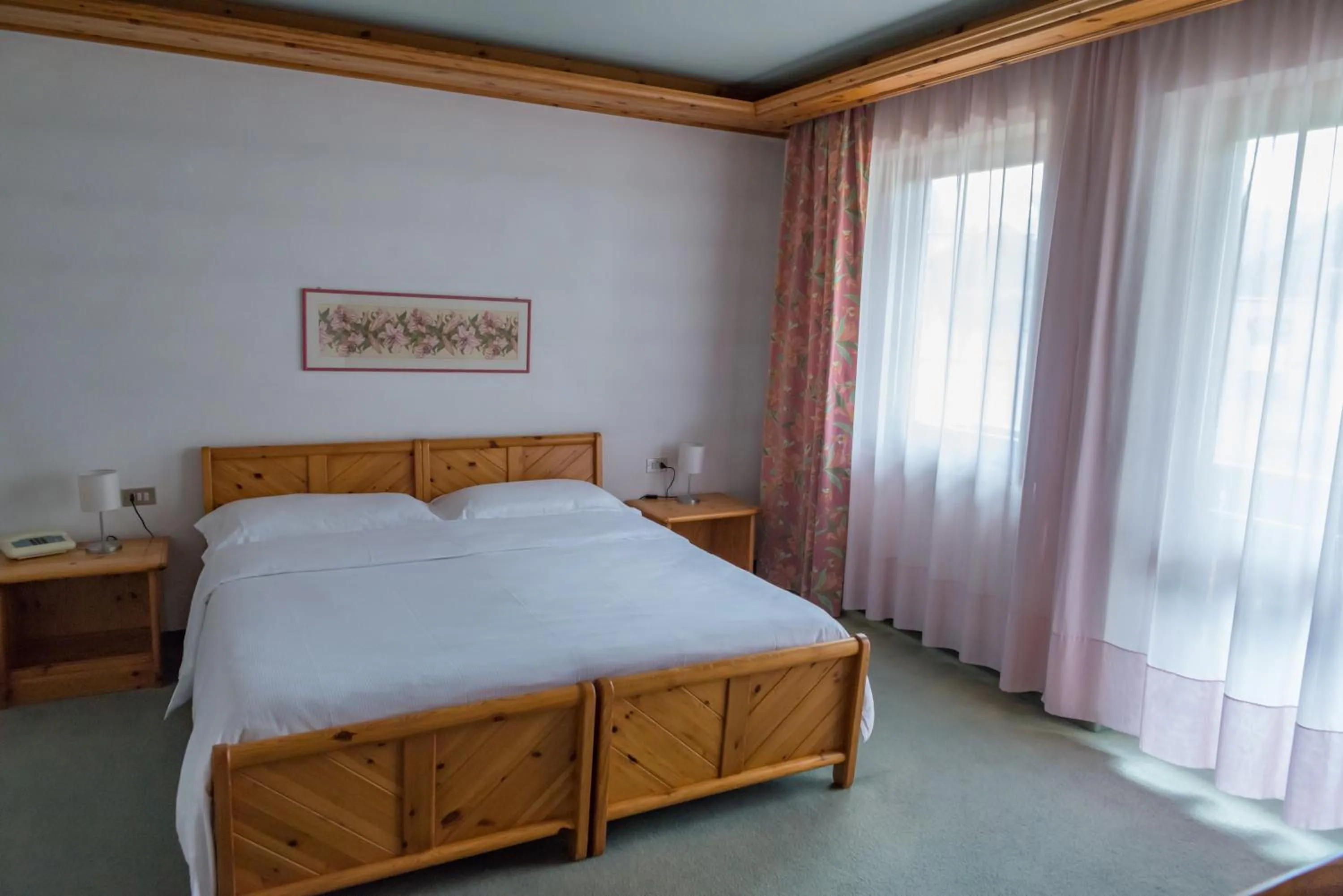 Bed in Sporthotel Europa Sul Lago