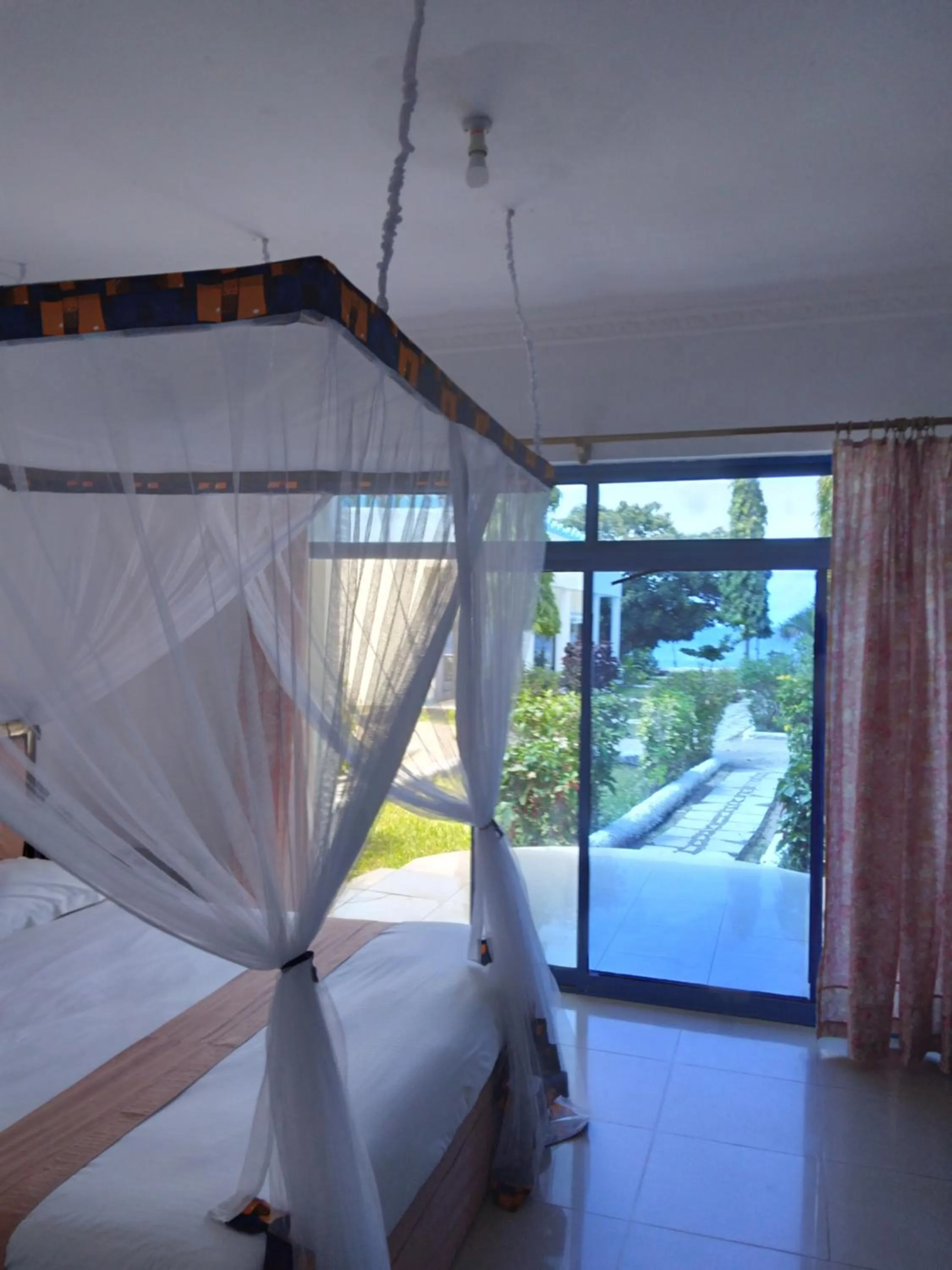 Bedroom in Coconut Tree Village Beach Resort