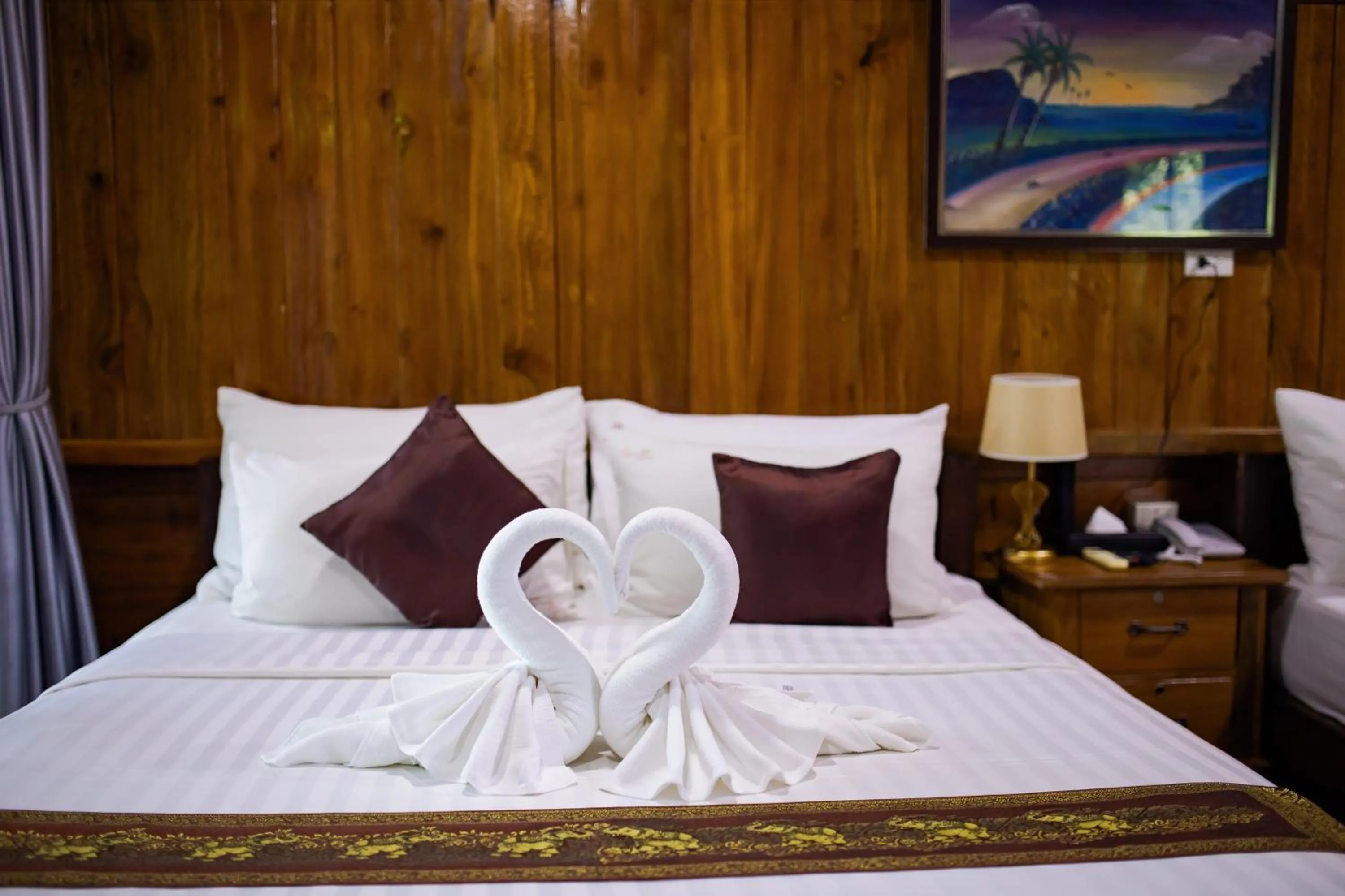 Bed in Chareena Hill Beach Resort