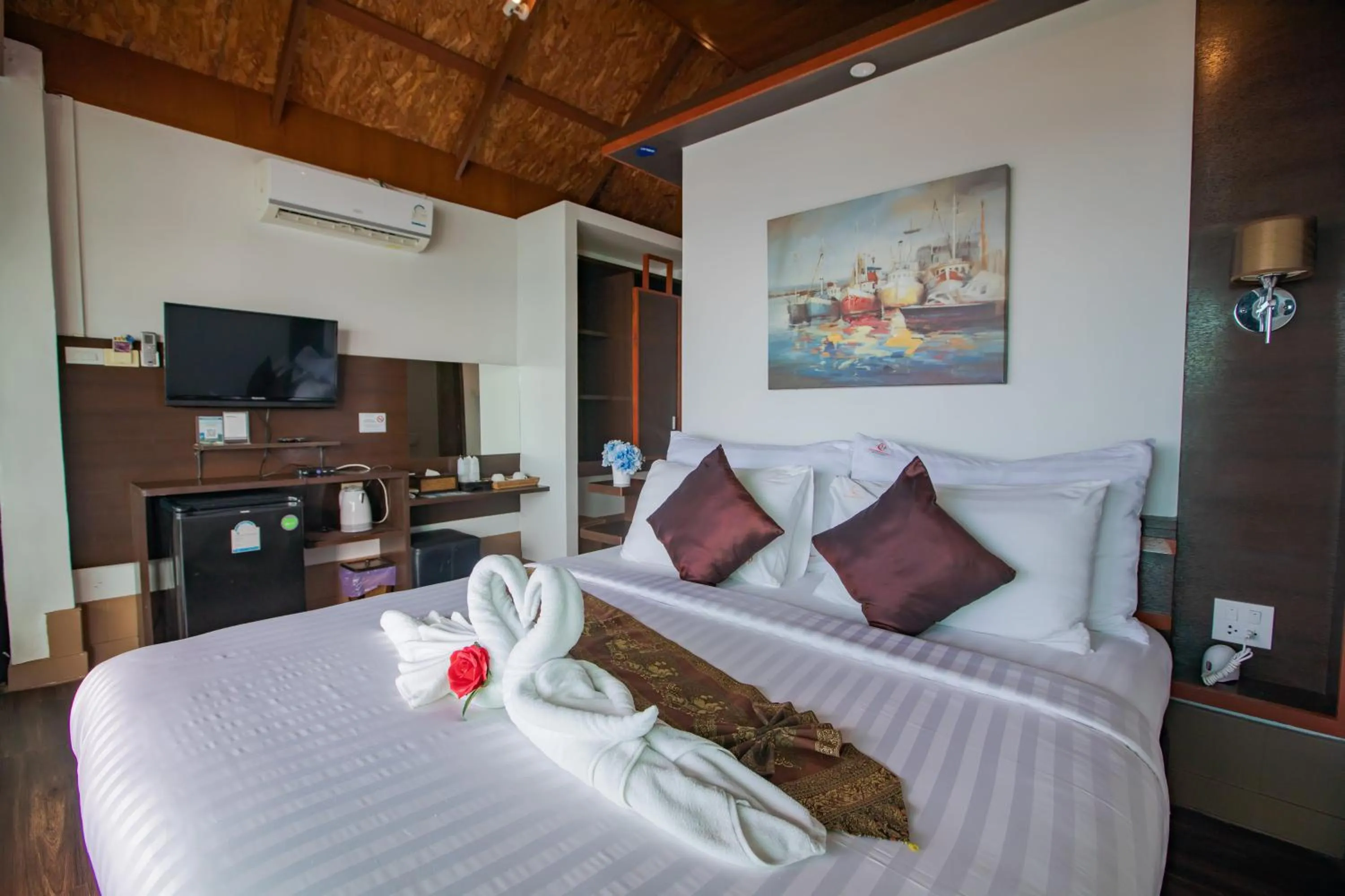 Bed in Chareena Hill Beach Resort