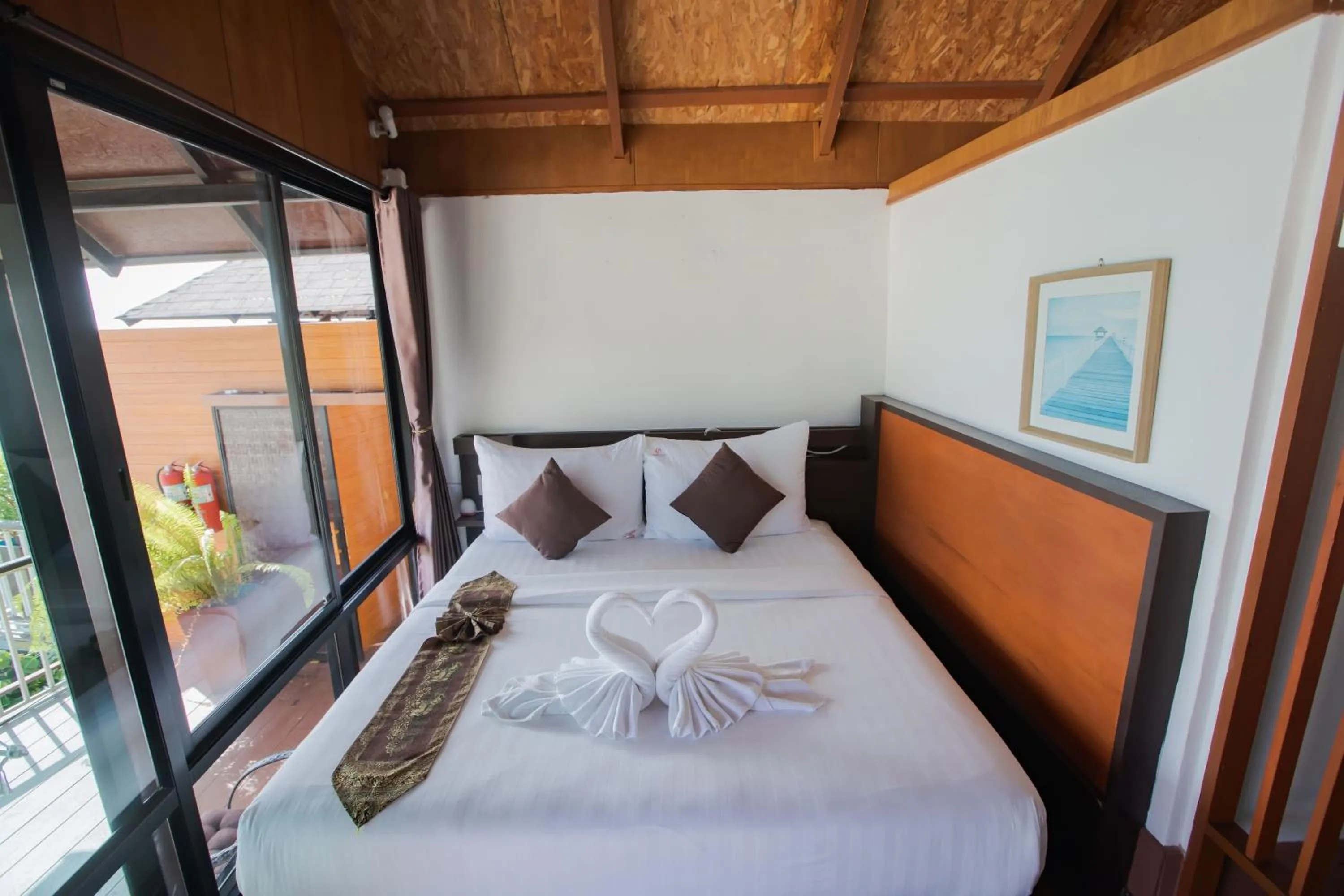Bed in Chareena Hill Beach Resort