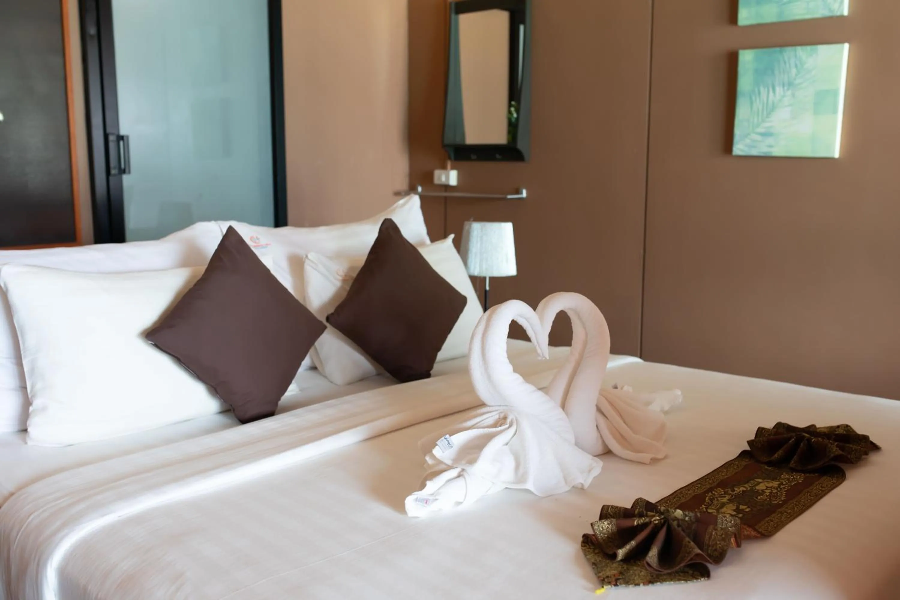 Bed in Chareena Hill Beach Resort