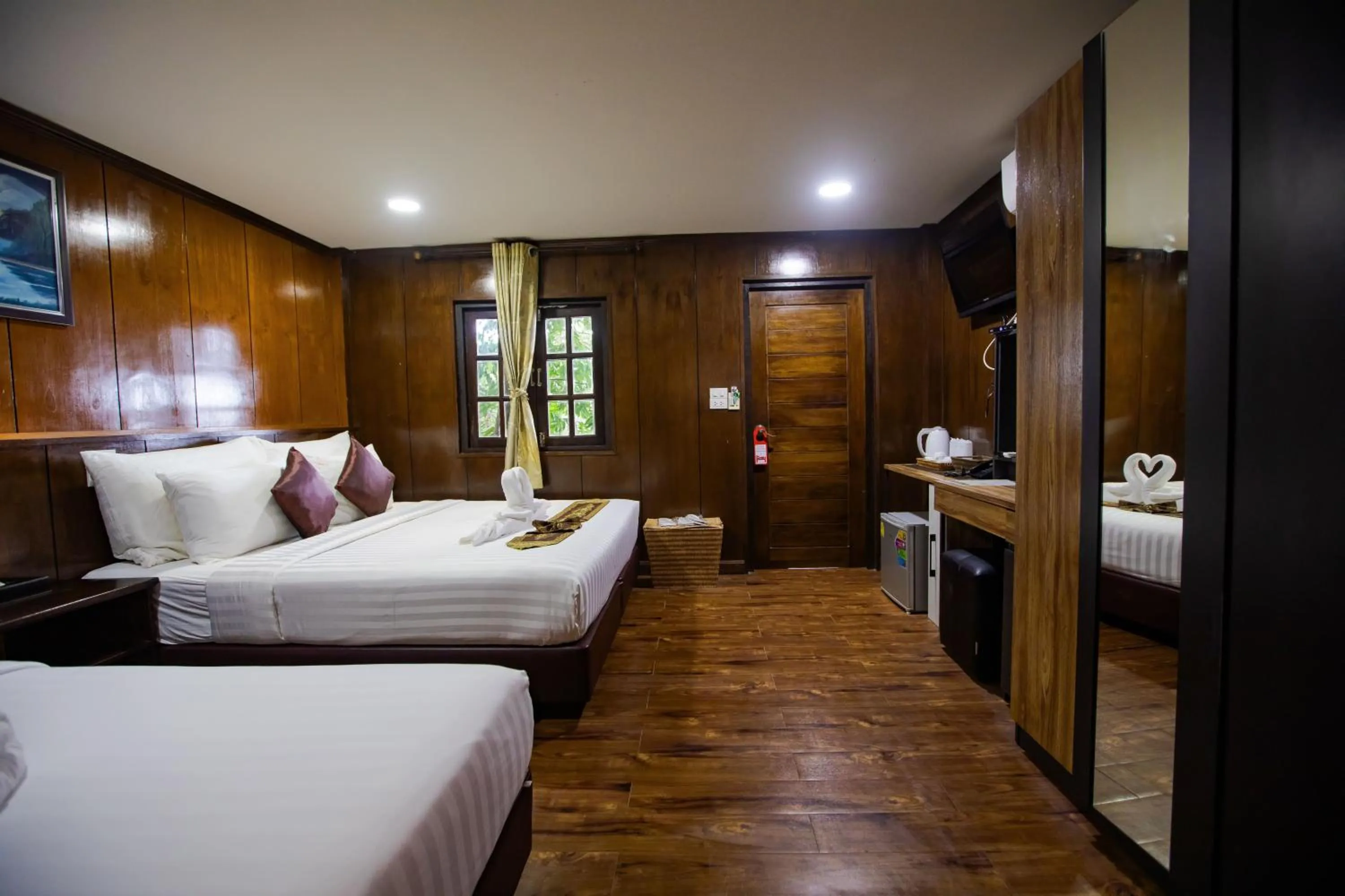 Bed in Chareena Hill Beach Resort