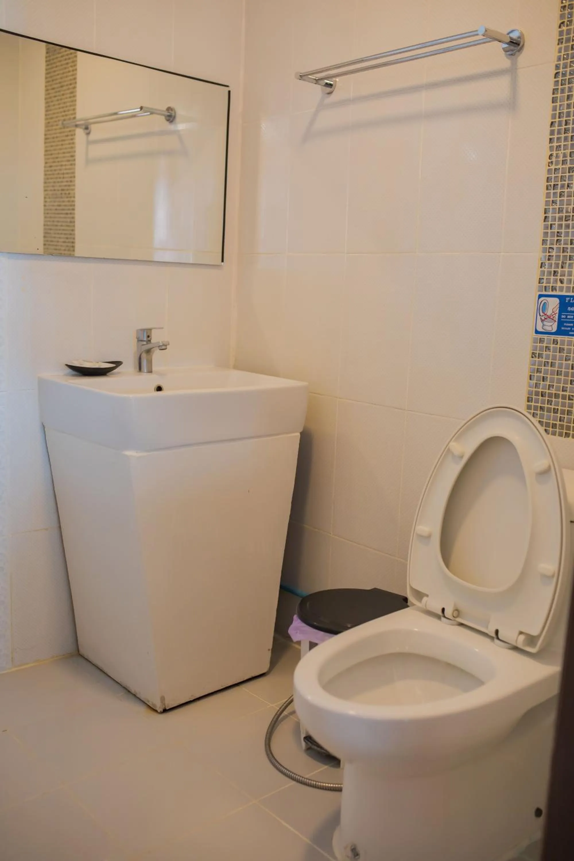 Toilet in Chareena Hill Beach Resort