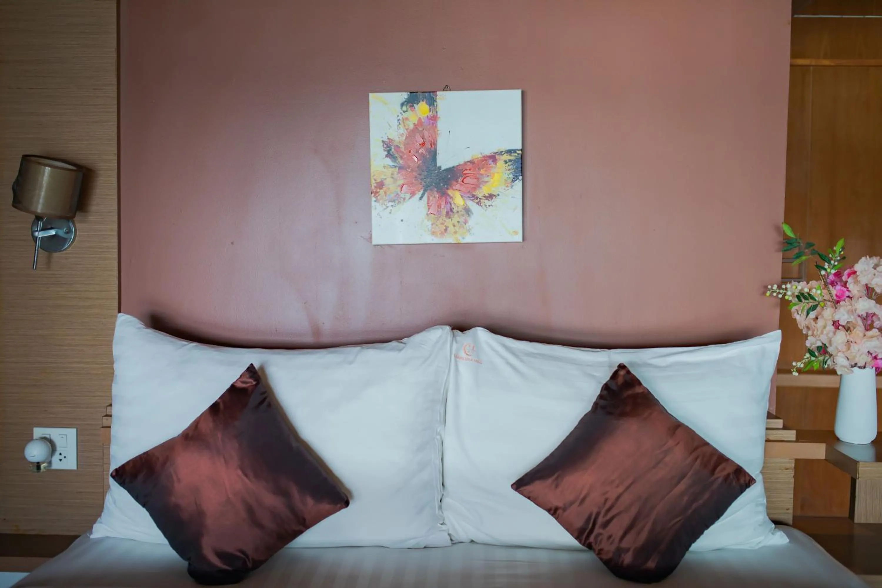 Bed in Chareena Hill Beach Resort