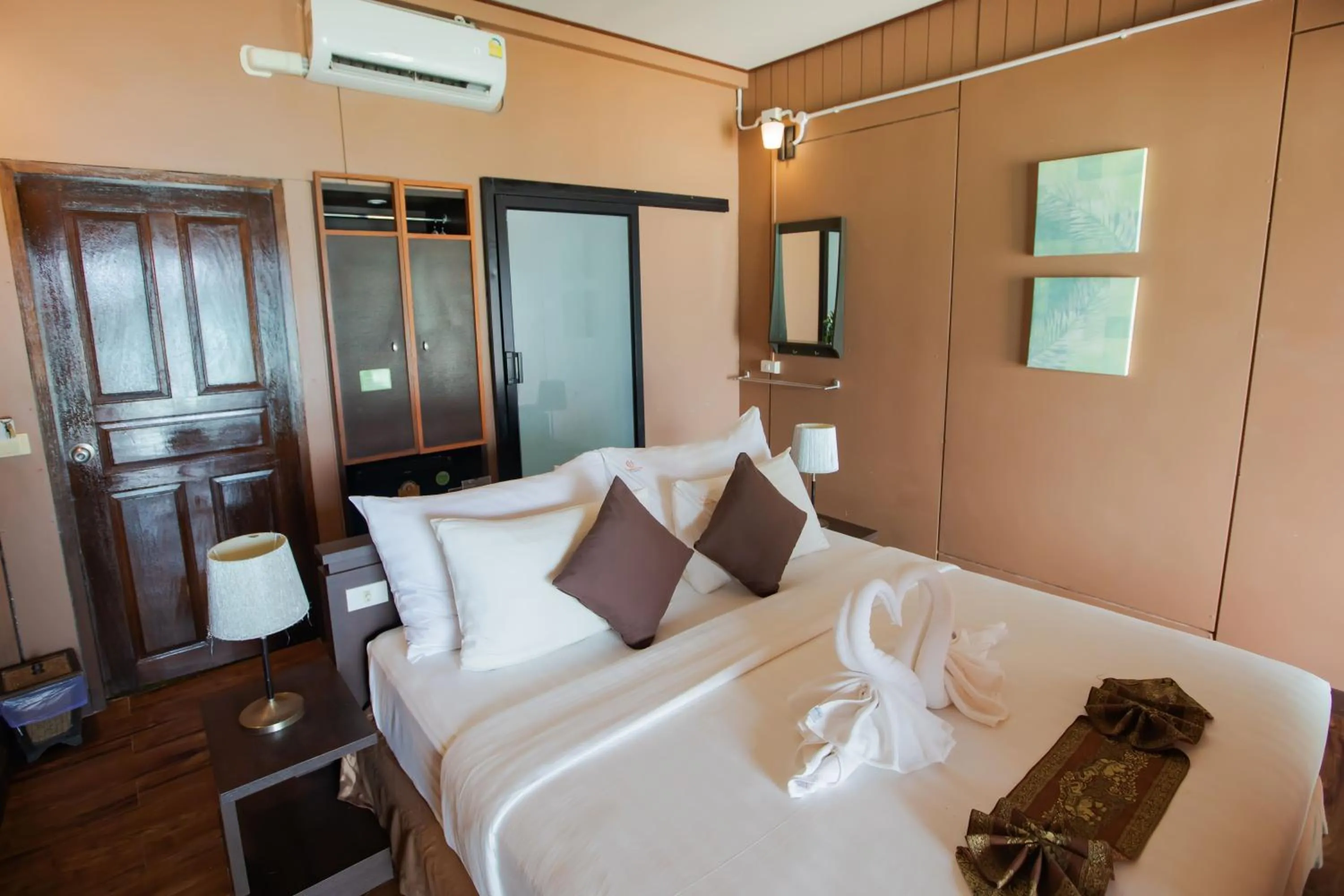 Bed in Chareena Hill Beach Resort