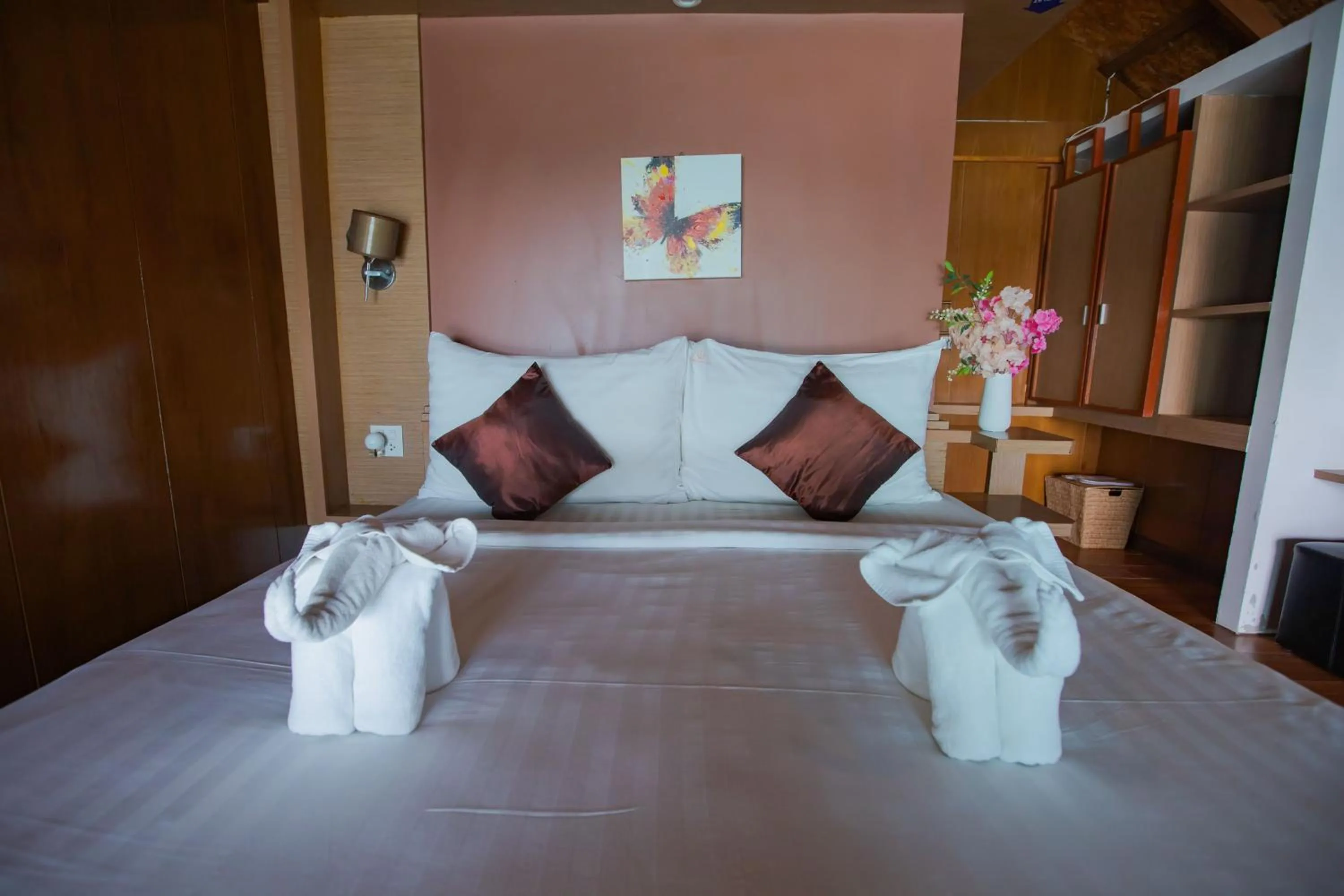 Bed in Chareena Hill Beach Resort