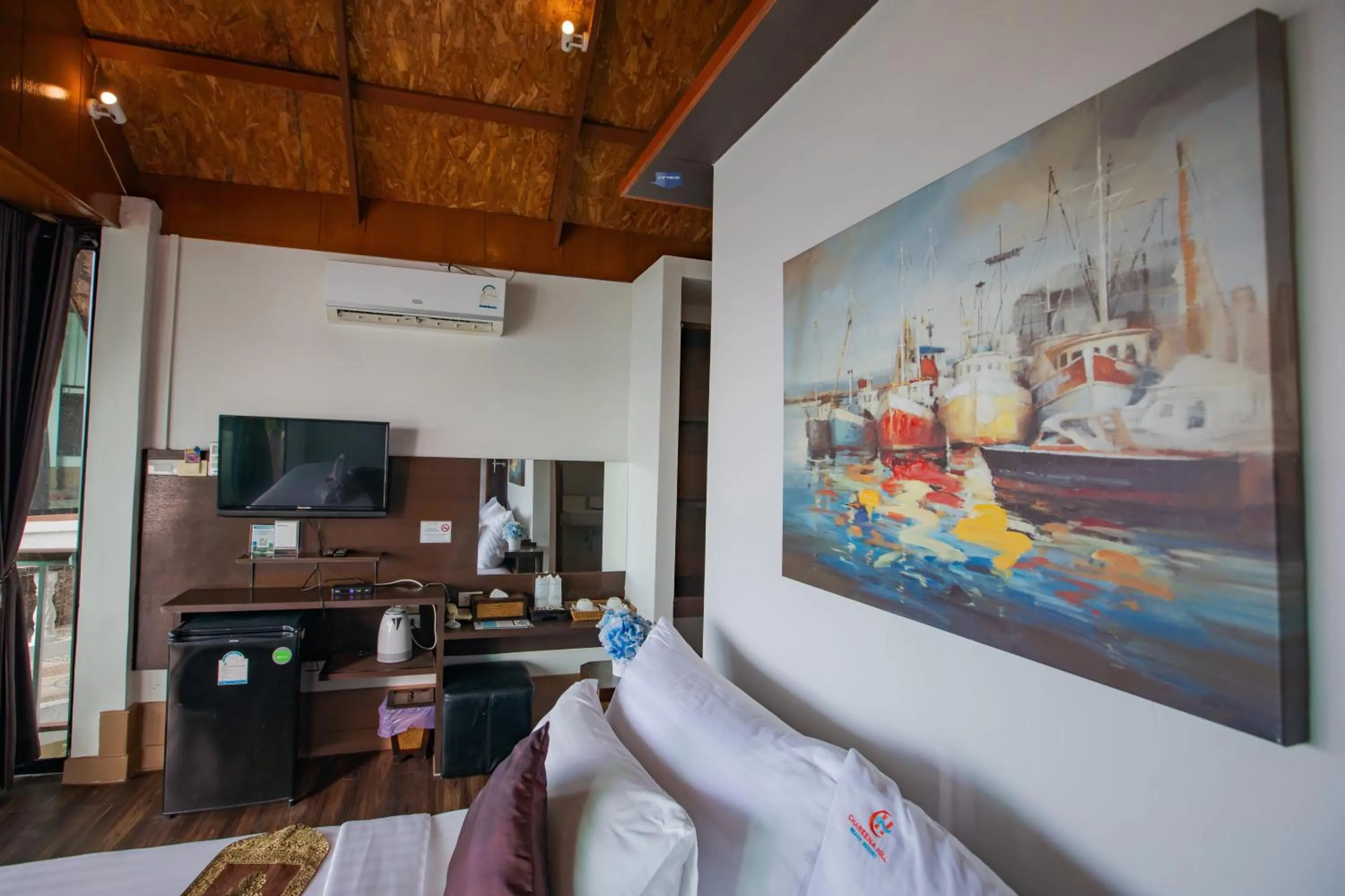 Bed in Chareena Hill Beach Resort