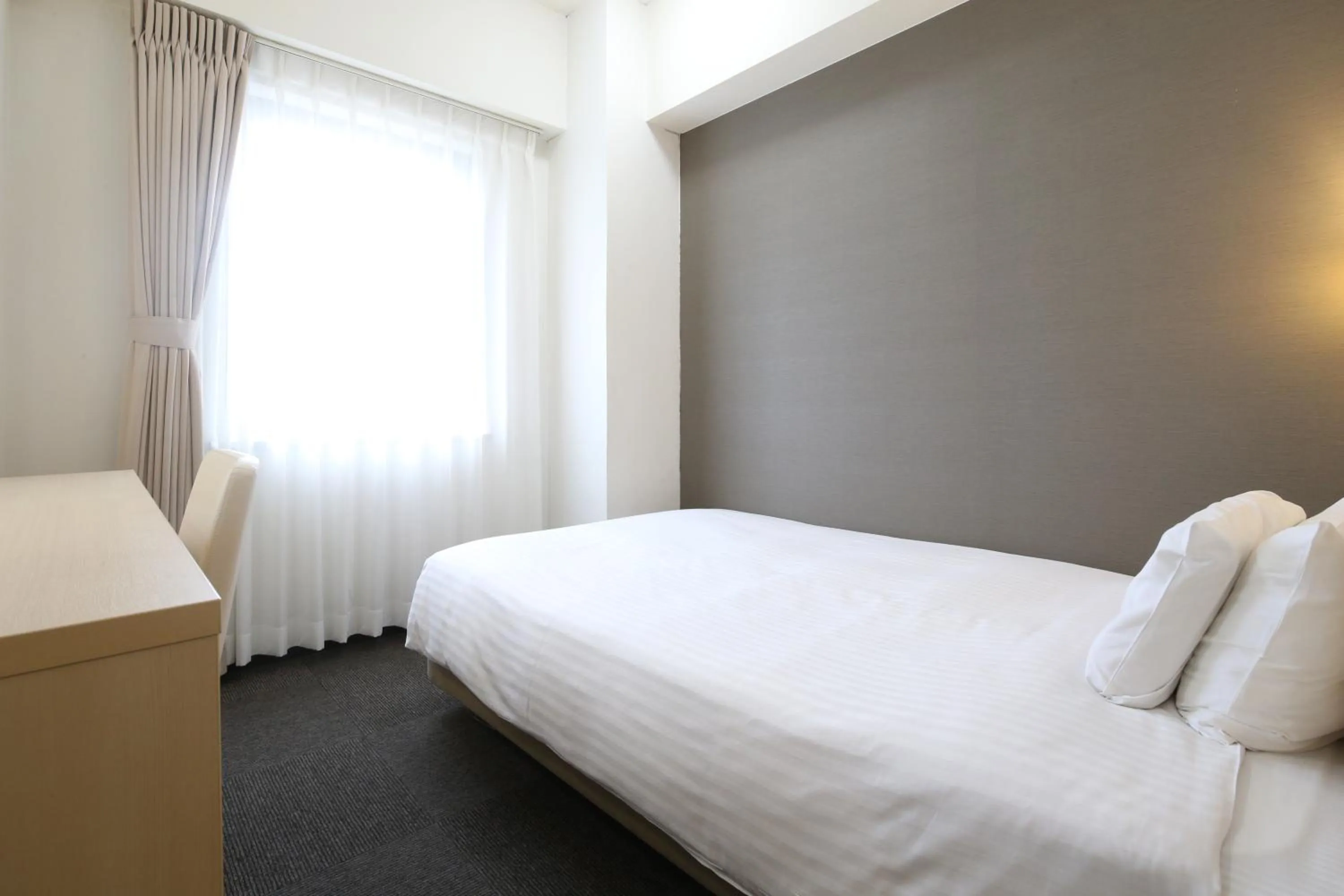 Bed in AB Hotel Mikawa Anjo Honkan