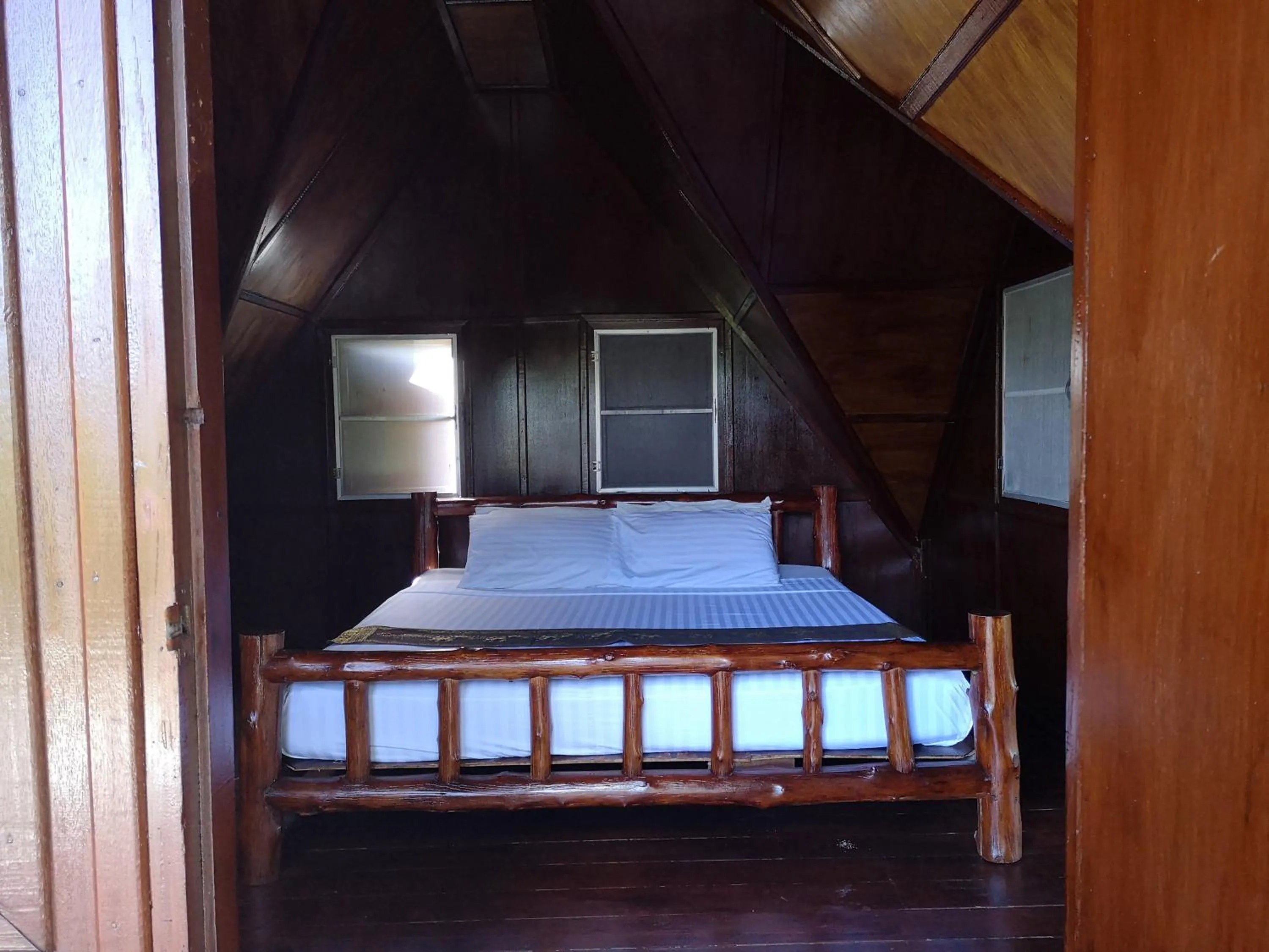 Bed in Koh Tao Royal Resort