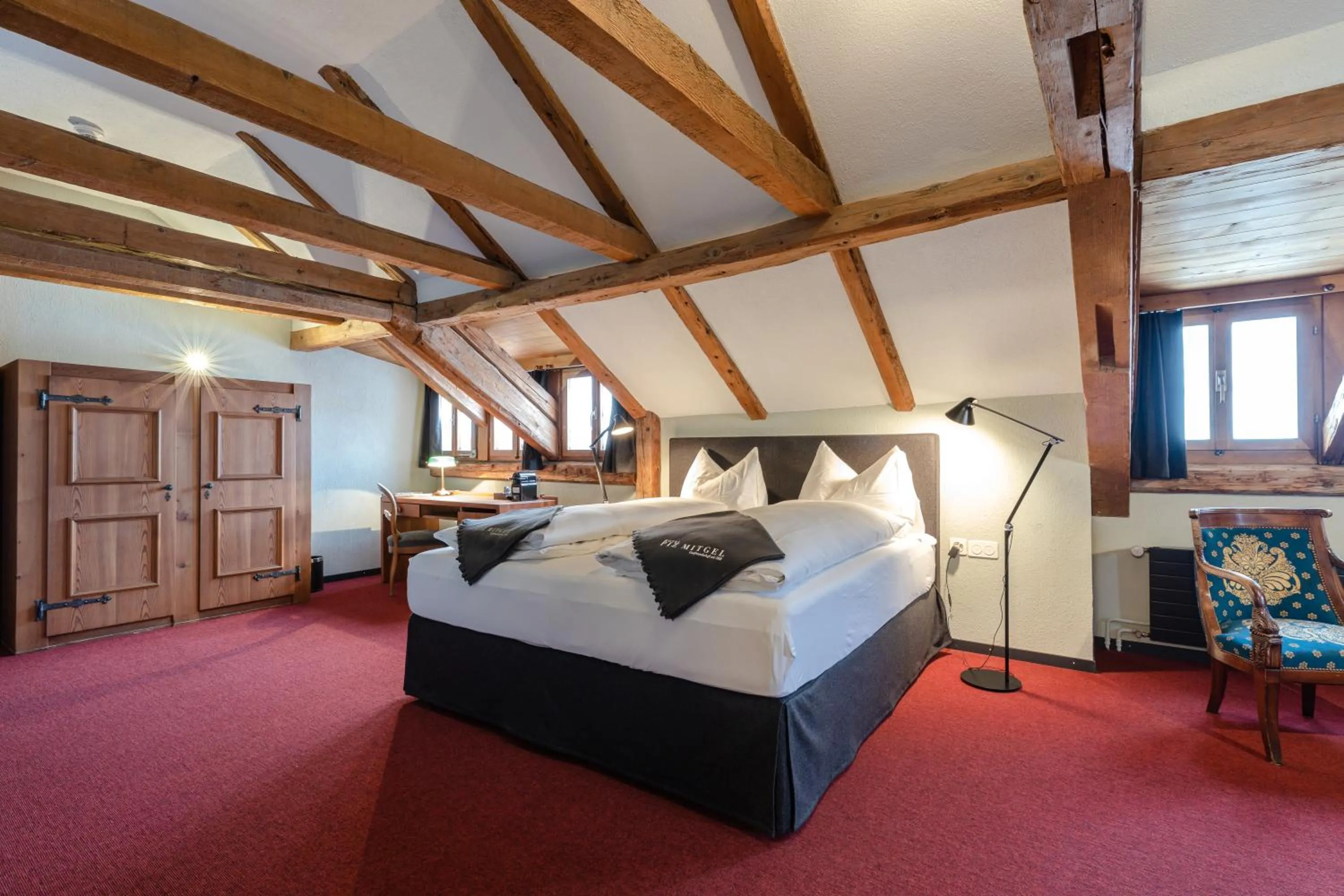 Bed in Hotel Piz Mitgel