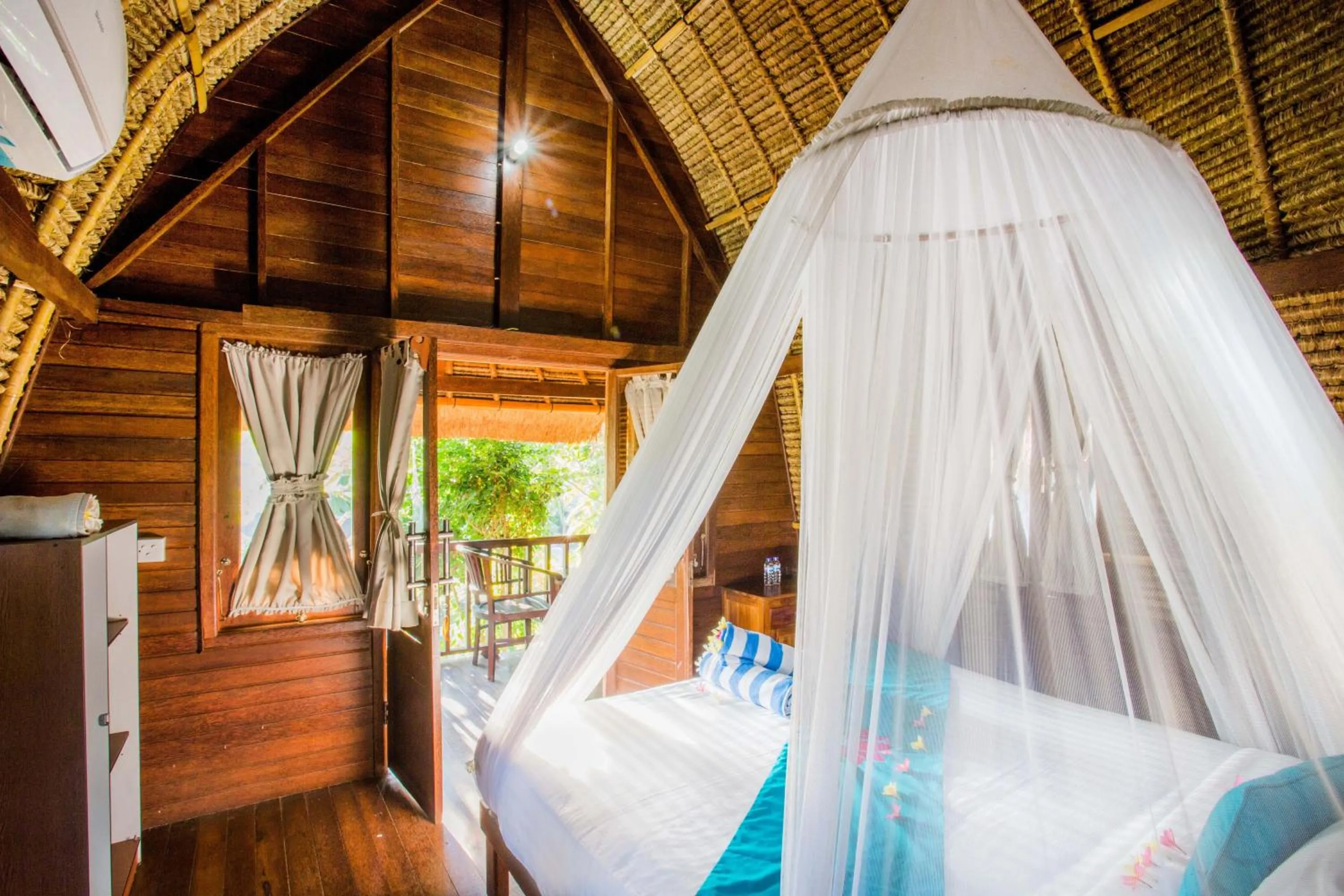 Bed in Lotus Garden Huts