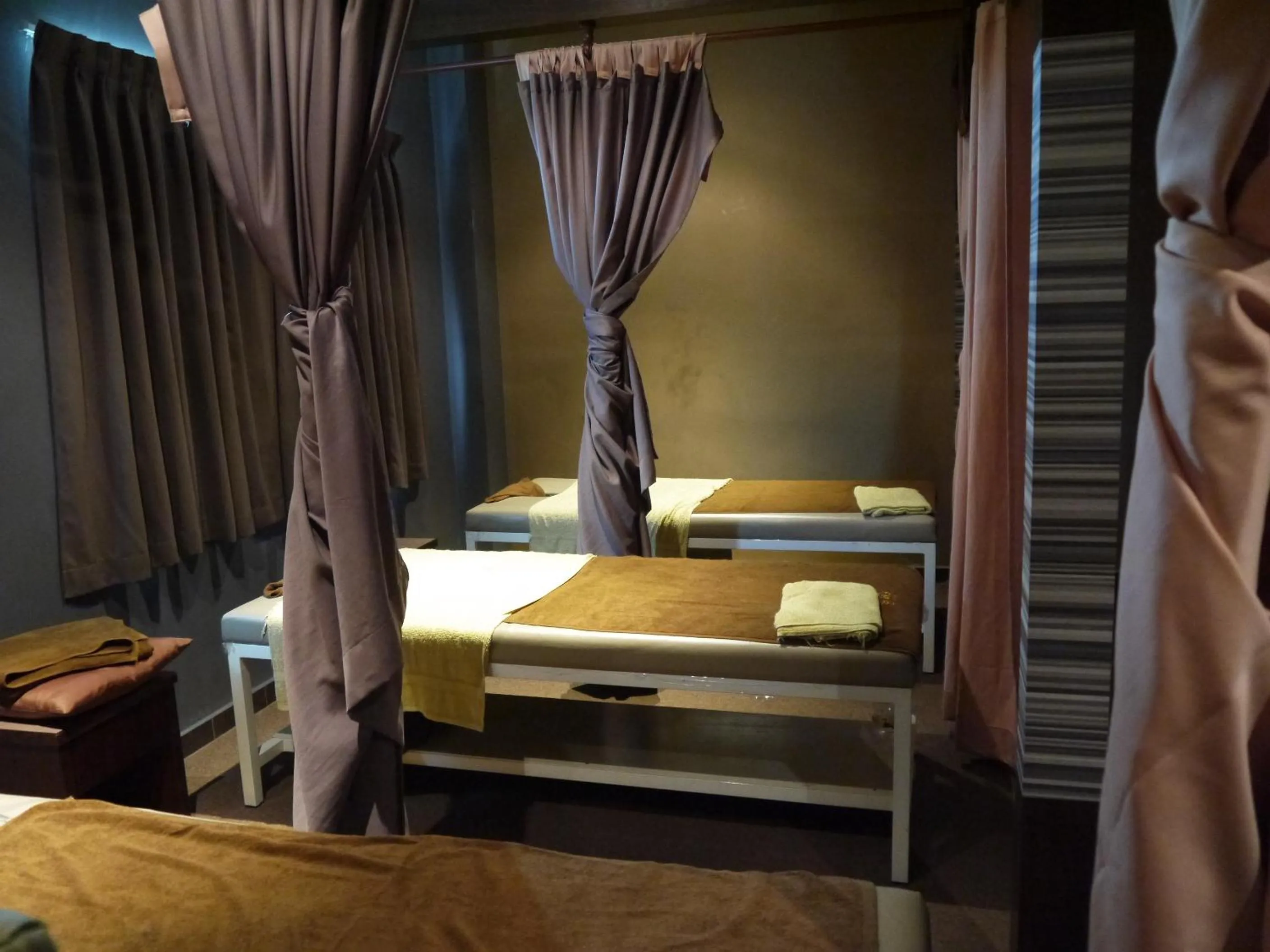 Bed in Grand Court Hotel