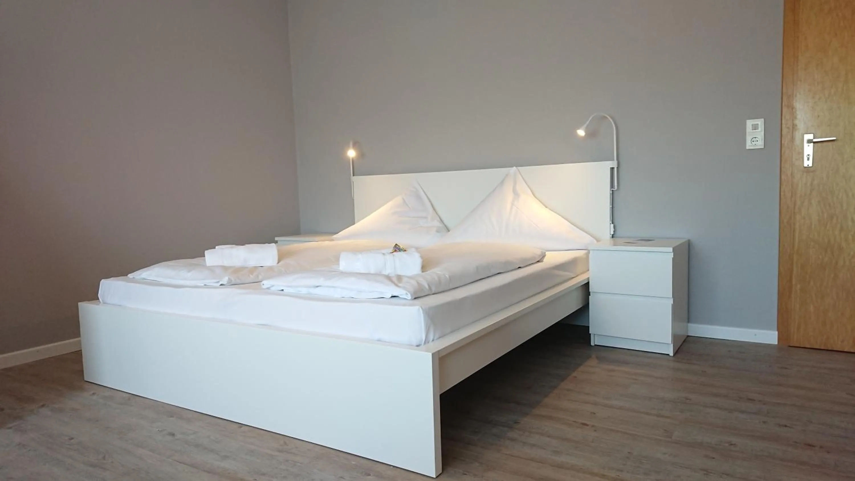 Bed in Ostseehotel Kappeln by team SchleiFee
