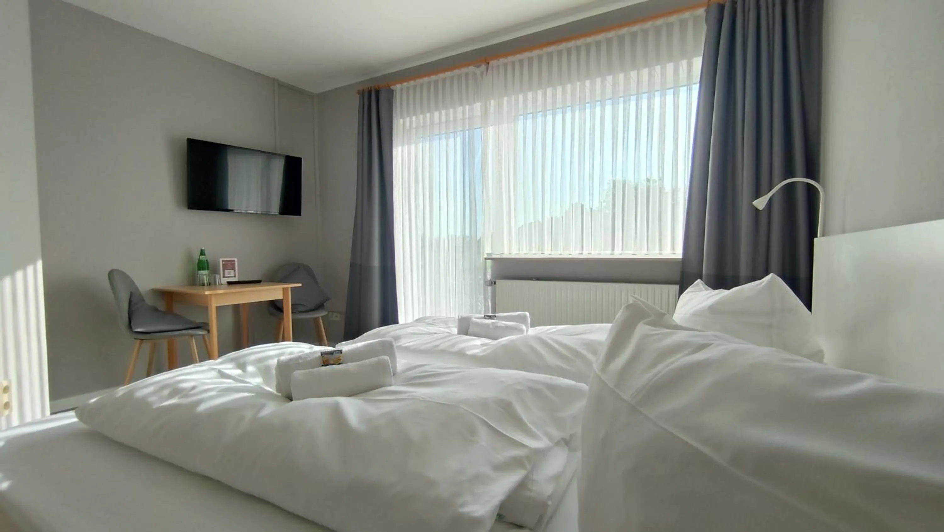 Bed in Ostseehotel Kappeln by team SchleiFee