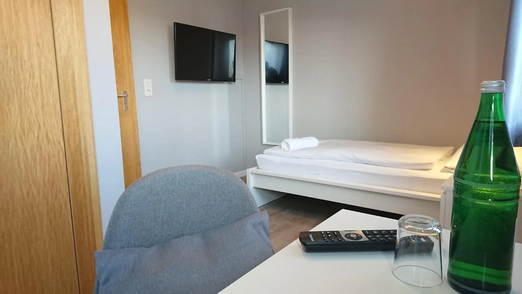 Bed in Ostseehotel Kappeln by team SchleiFee