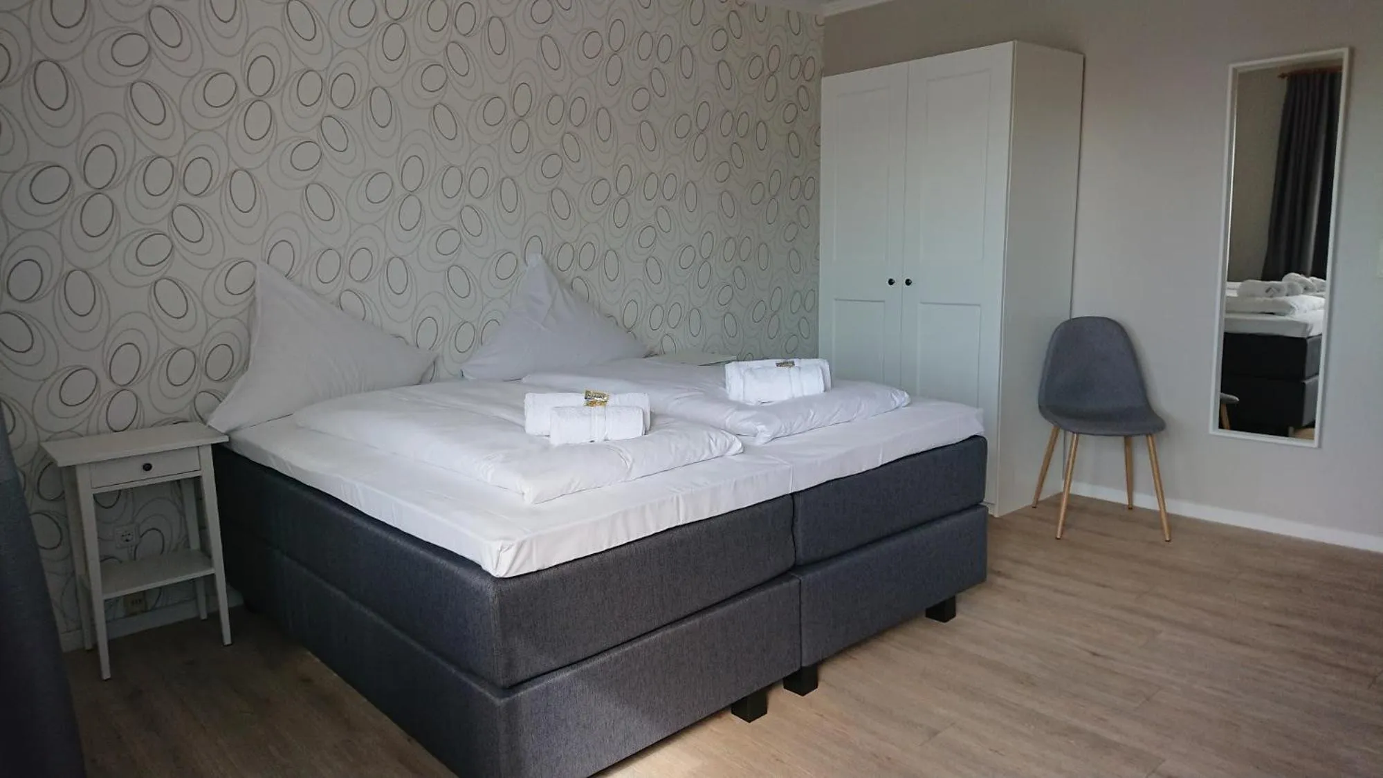 Bed in Ostseehotel Kappeln by team SchleiFee