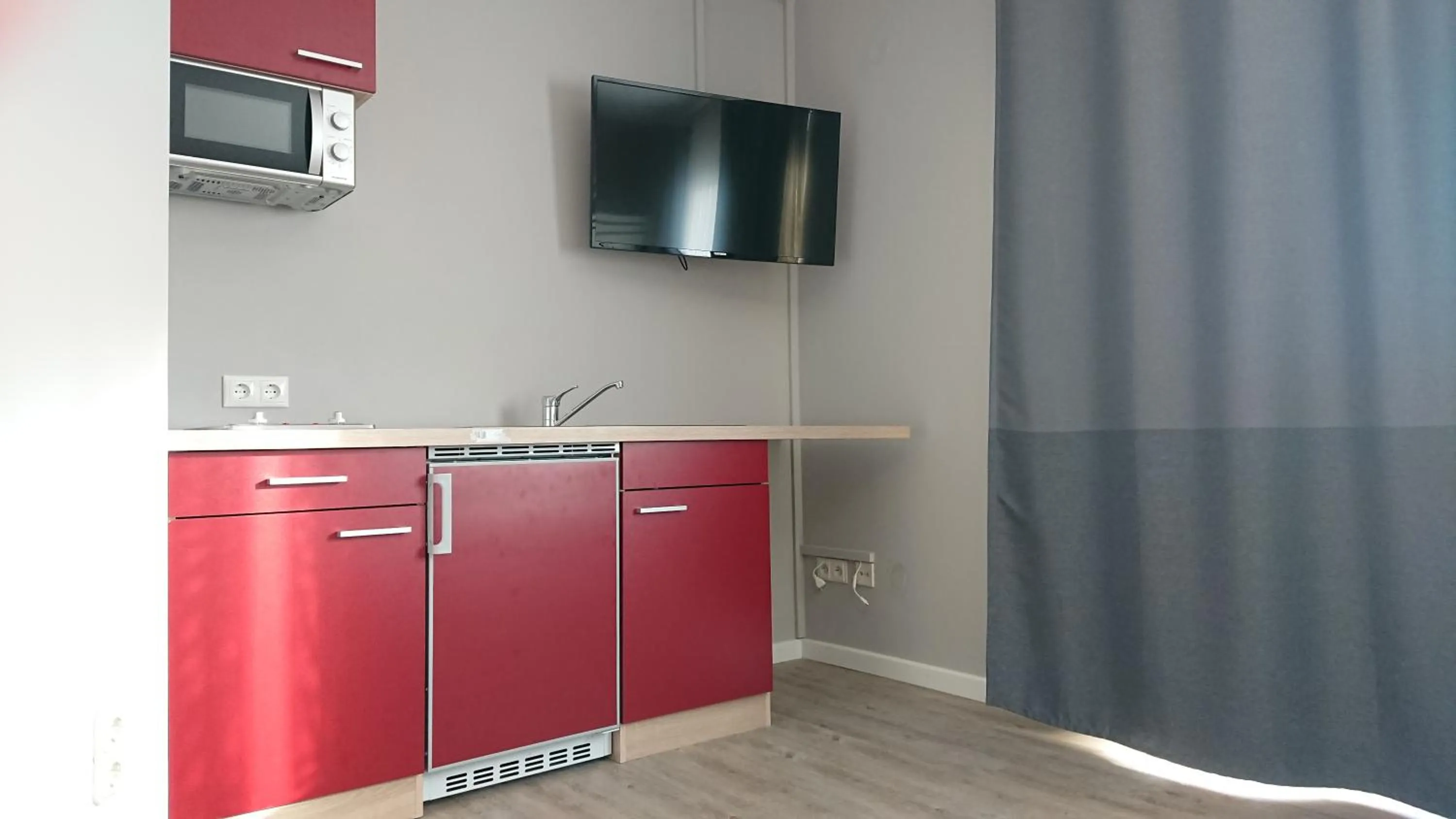 Kitchen or kitchenette in Ostseehotel Kappeln by team SchleiFee