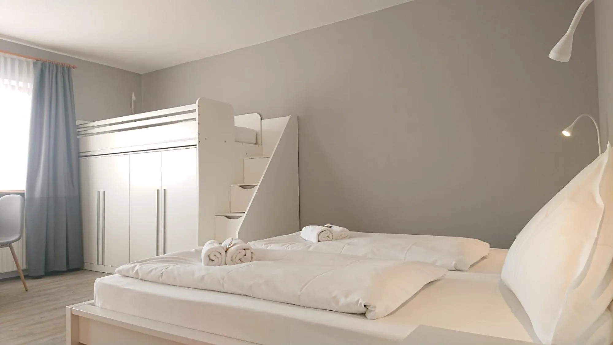 Bed in Ostseehotel Kappeln by team SchleiFee