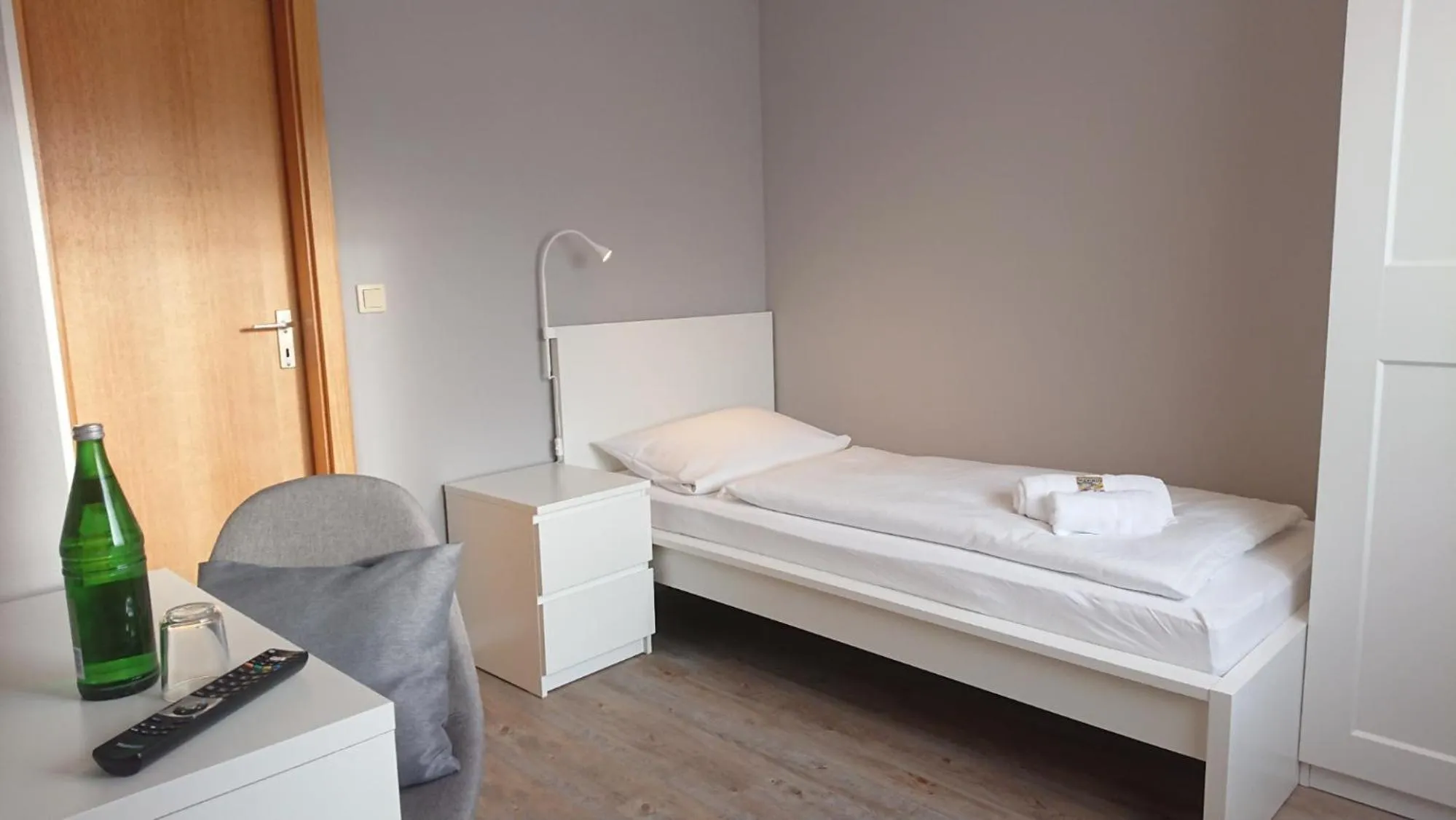 Bed in Ostseehotel Kappeln by team SchleiFee