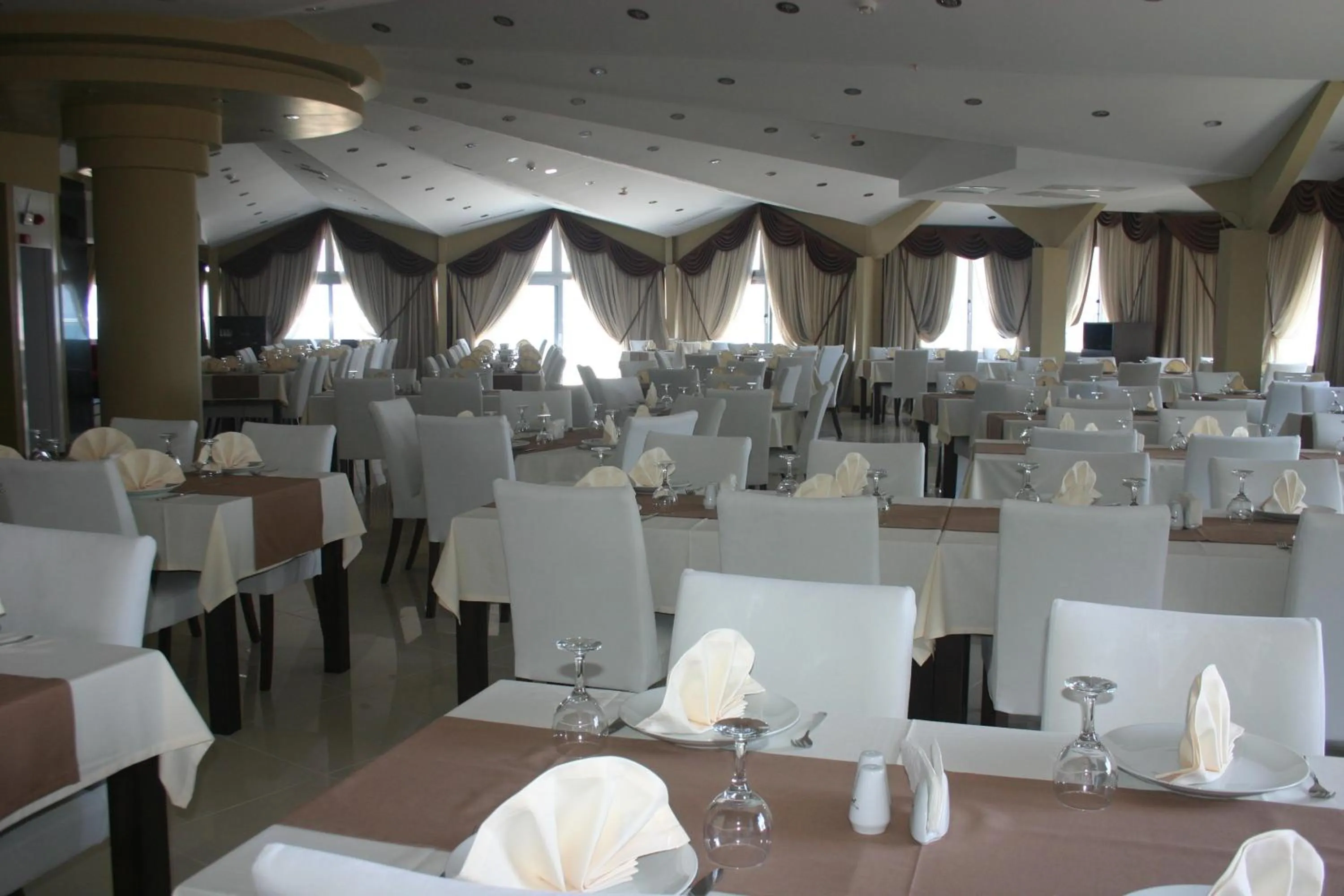 Dining area in Grand Ahos Hotel
